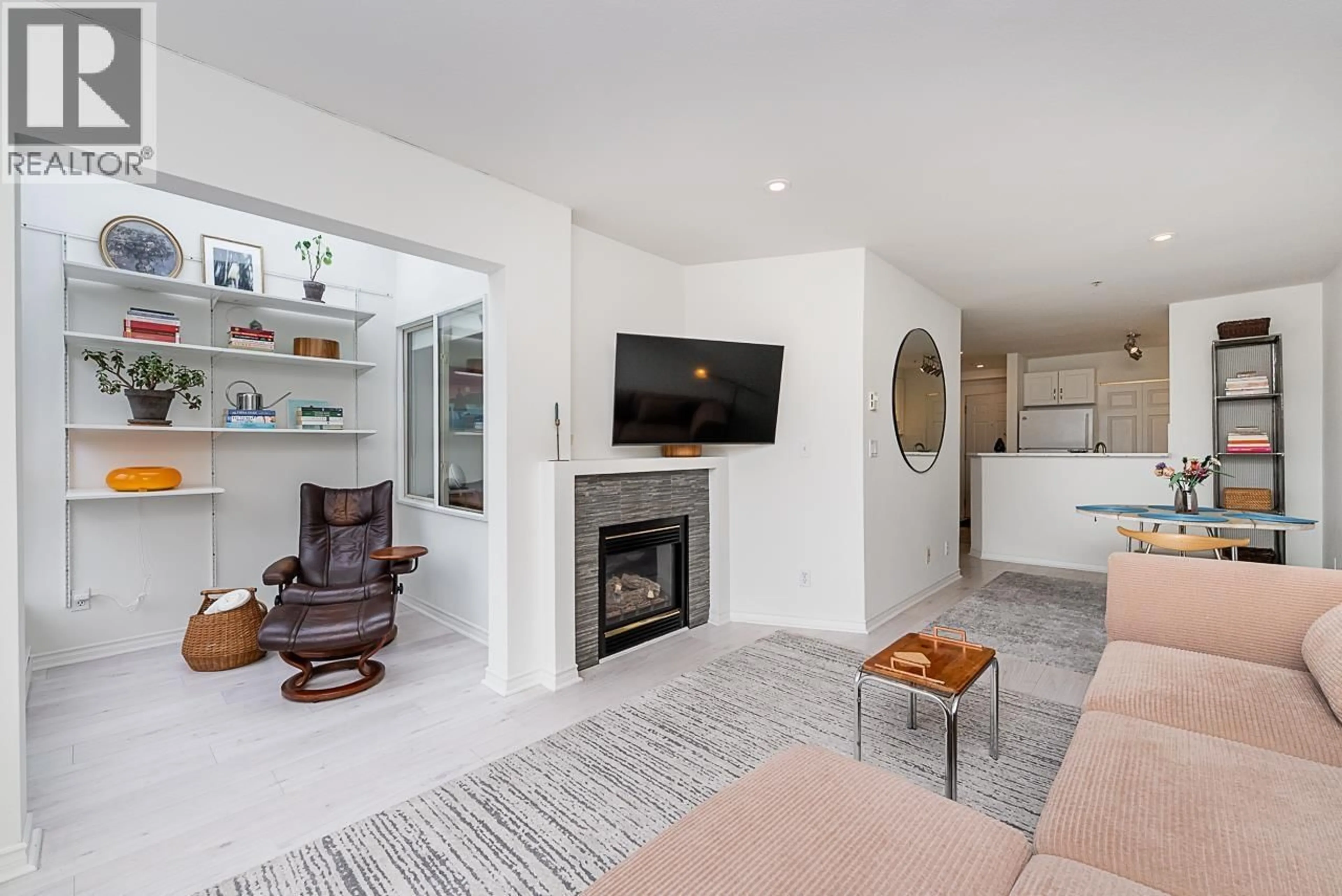 Living room with furniture, ceramic/tile floor for 409 - 1688 4TH AVENUE, Vancouver British Columbia V5N1J8