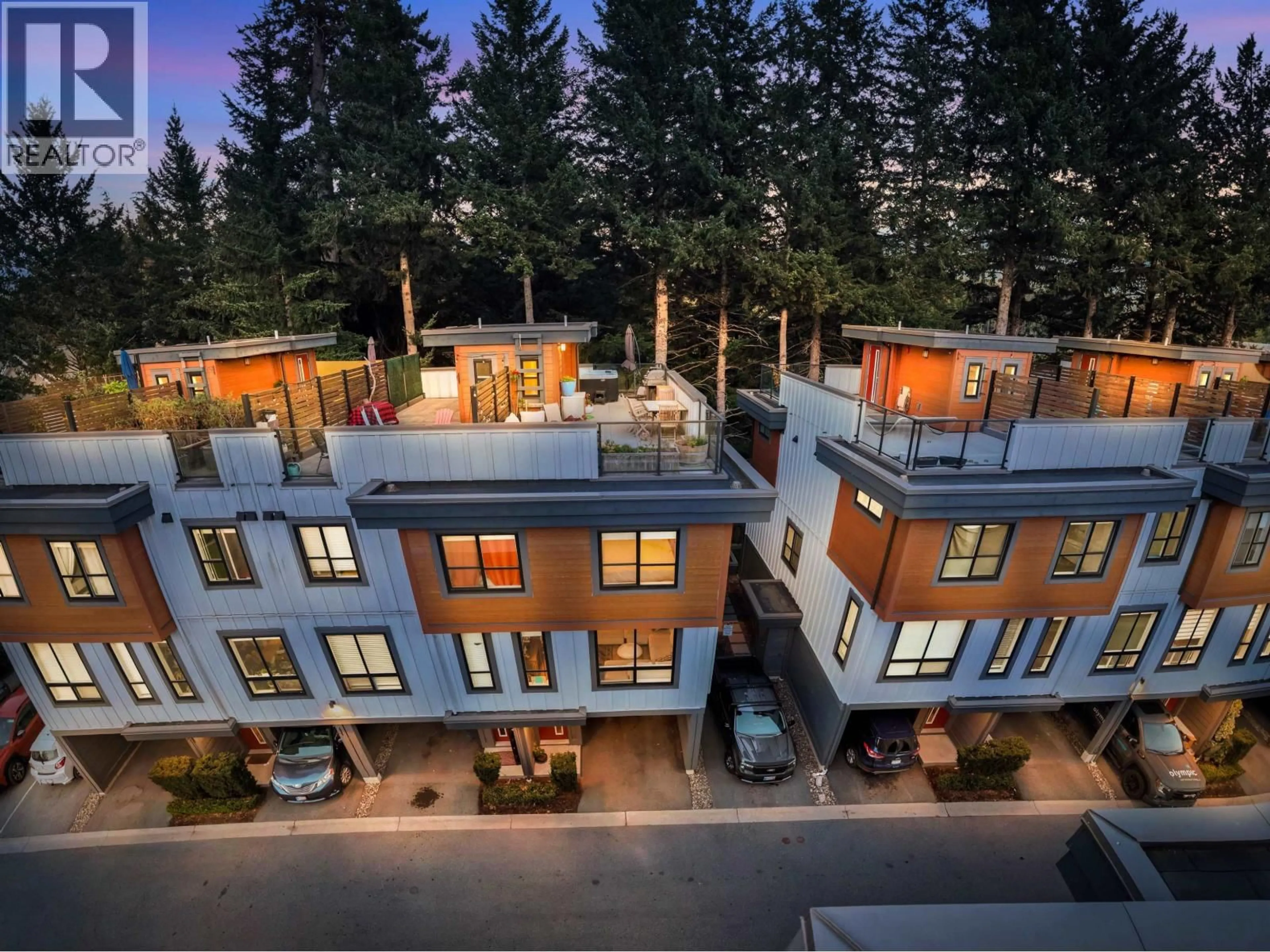 A pic from outside/outdoor area/front of a property/back of a property/a pic from drone, street for 64 - 39769 GOVERNMENT ROAD, Squamish British Columbia V8B0Z1