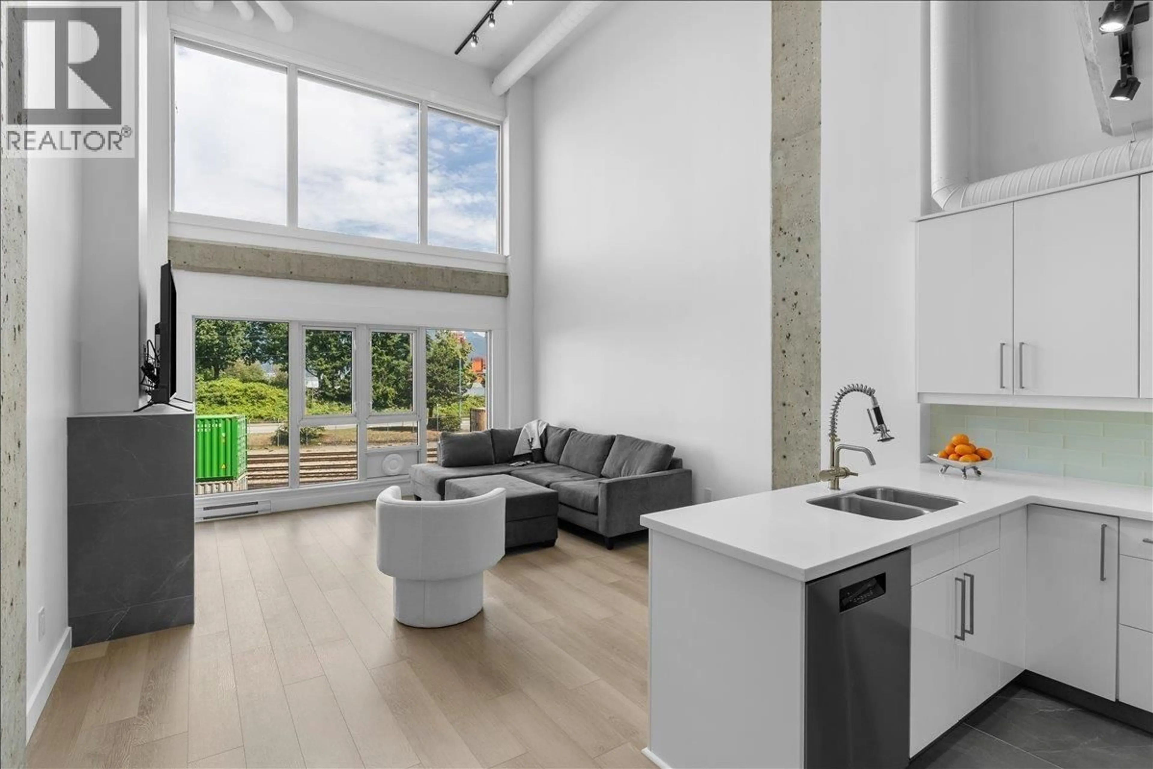 Open concept kitchen, unknown for 309 - 27 ALEXANDER STREET, Vancouver British Columbia V6A1B2