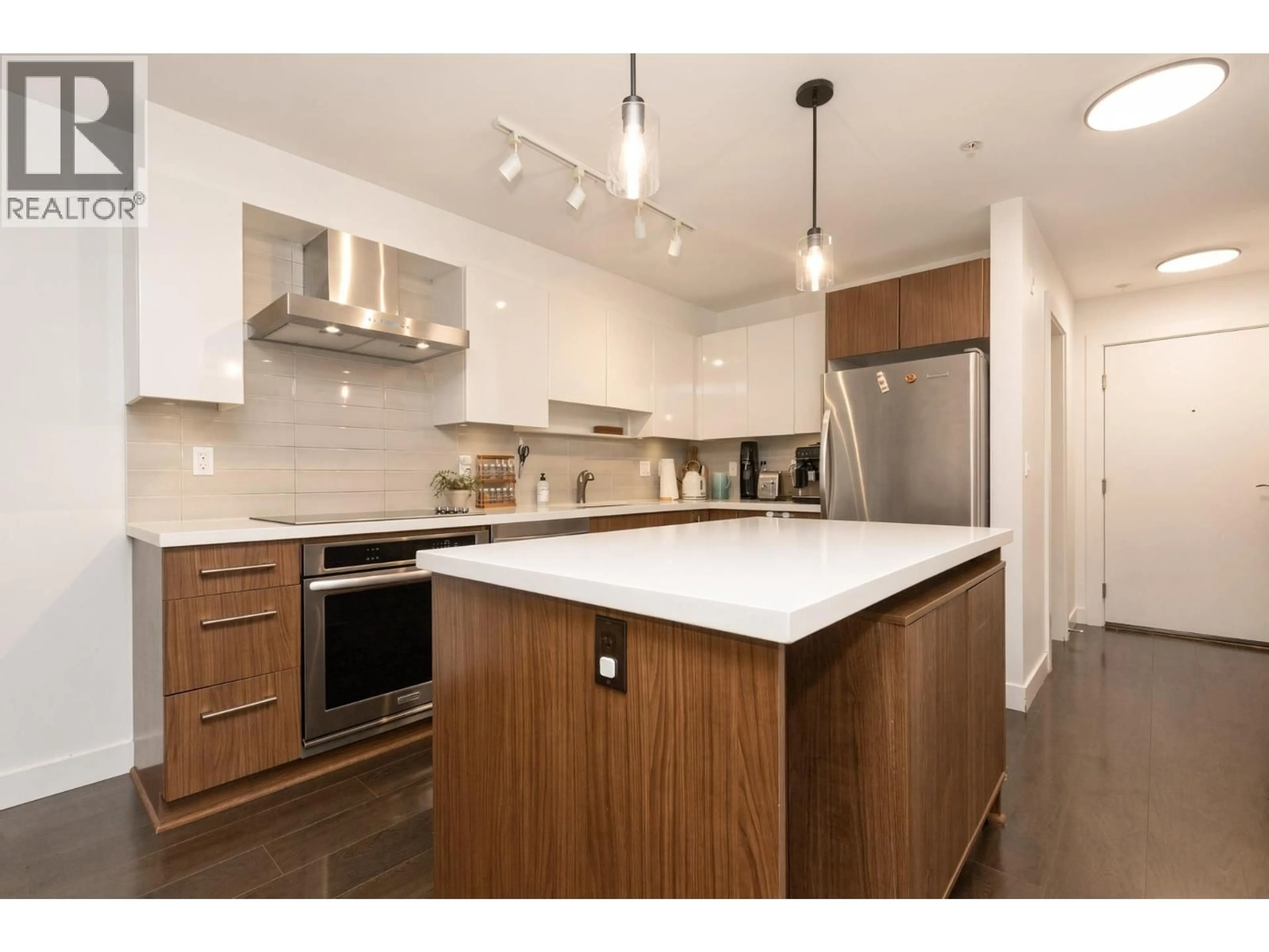 Open concept kitchen, unknown for 104 - 7131 STRIDE AVENUE, Burnaby British Columbia V3N0E3