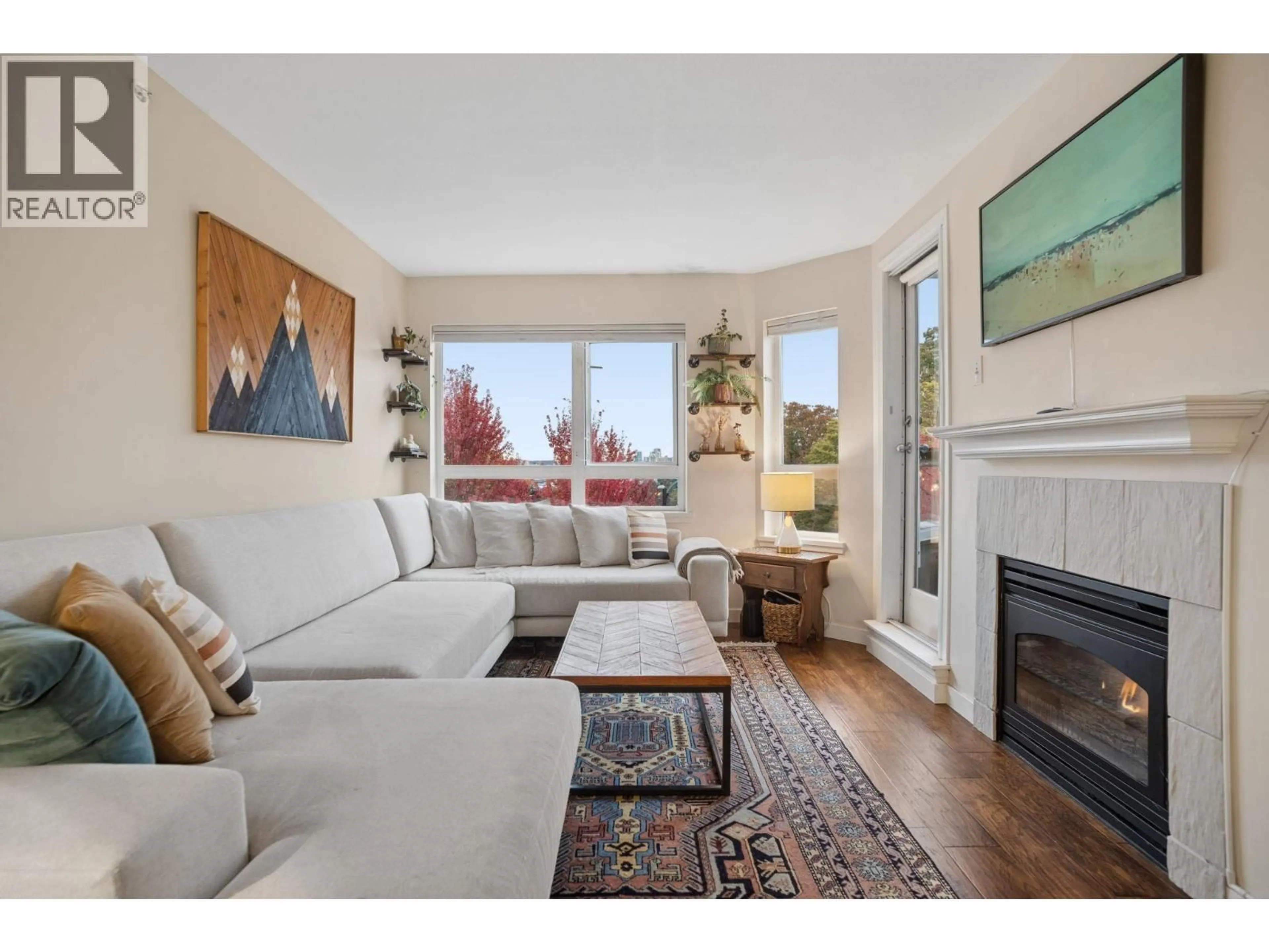 Living room with furniture, unknown for 305 - 1707 CHARLES STREET, Vancouver British Columbia V5L2T6