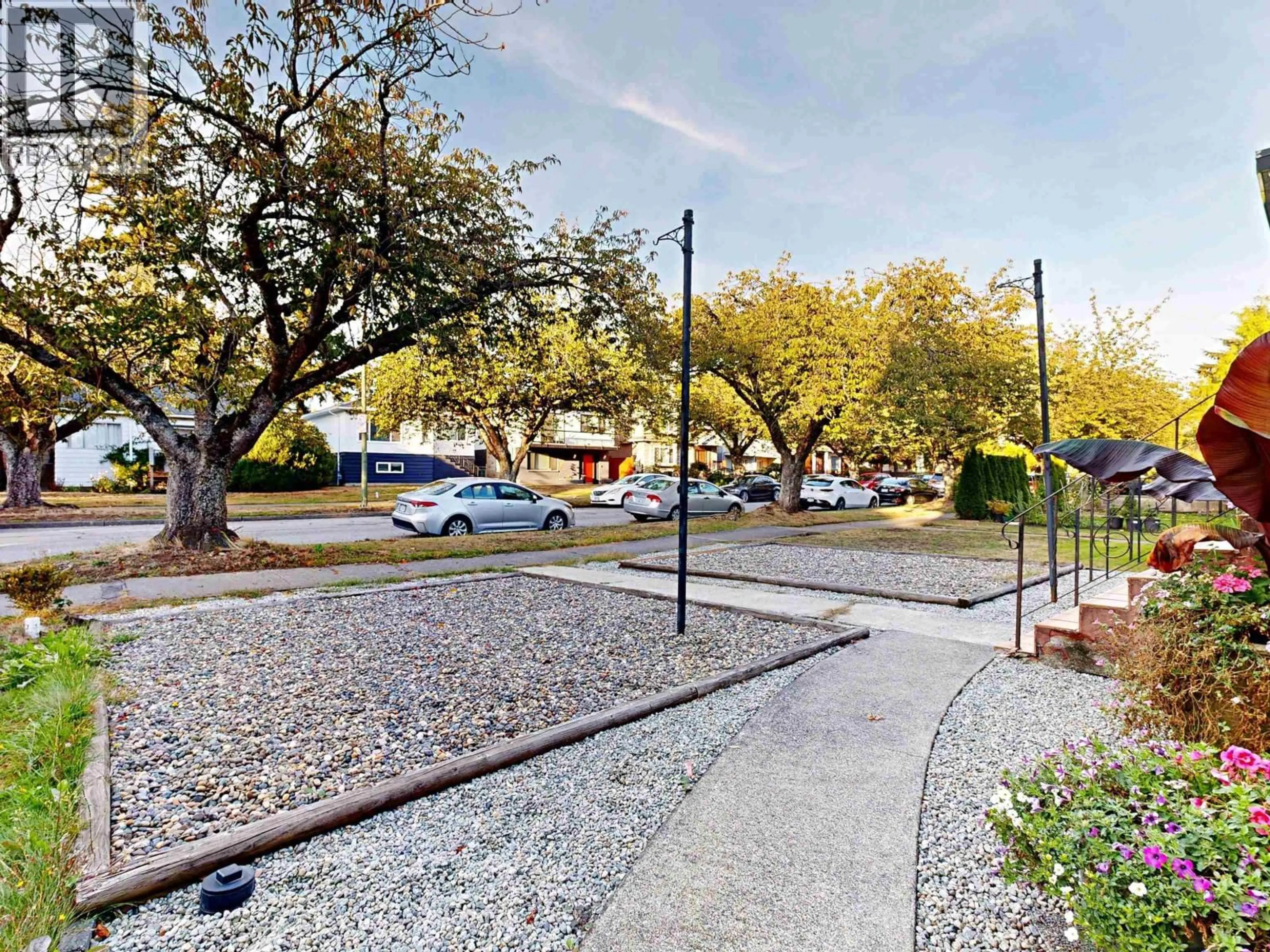 A pic from outside/outdoor area/front of a property/back of a property/a pic from drone, street for 1222 51ST AVENUE, Vancouver British Columbia V5X1E8