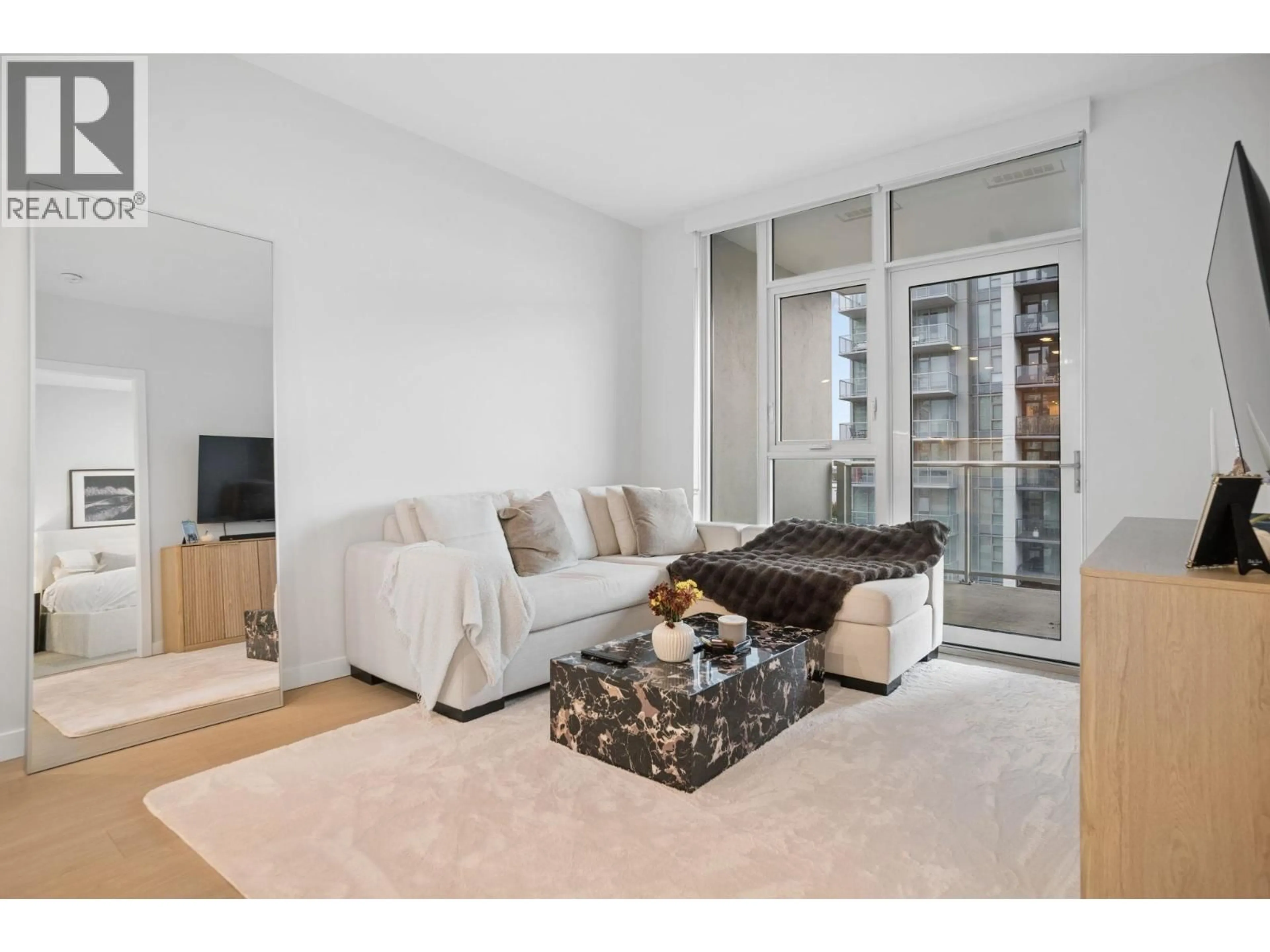 Living room with furniture, unknown for 1203 - 4168 LOUGHEED HIGHWAY, Burnaby British Columbia V5C0N9