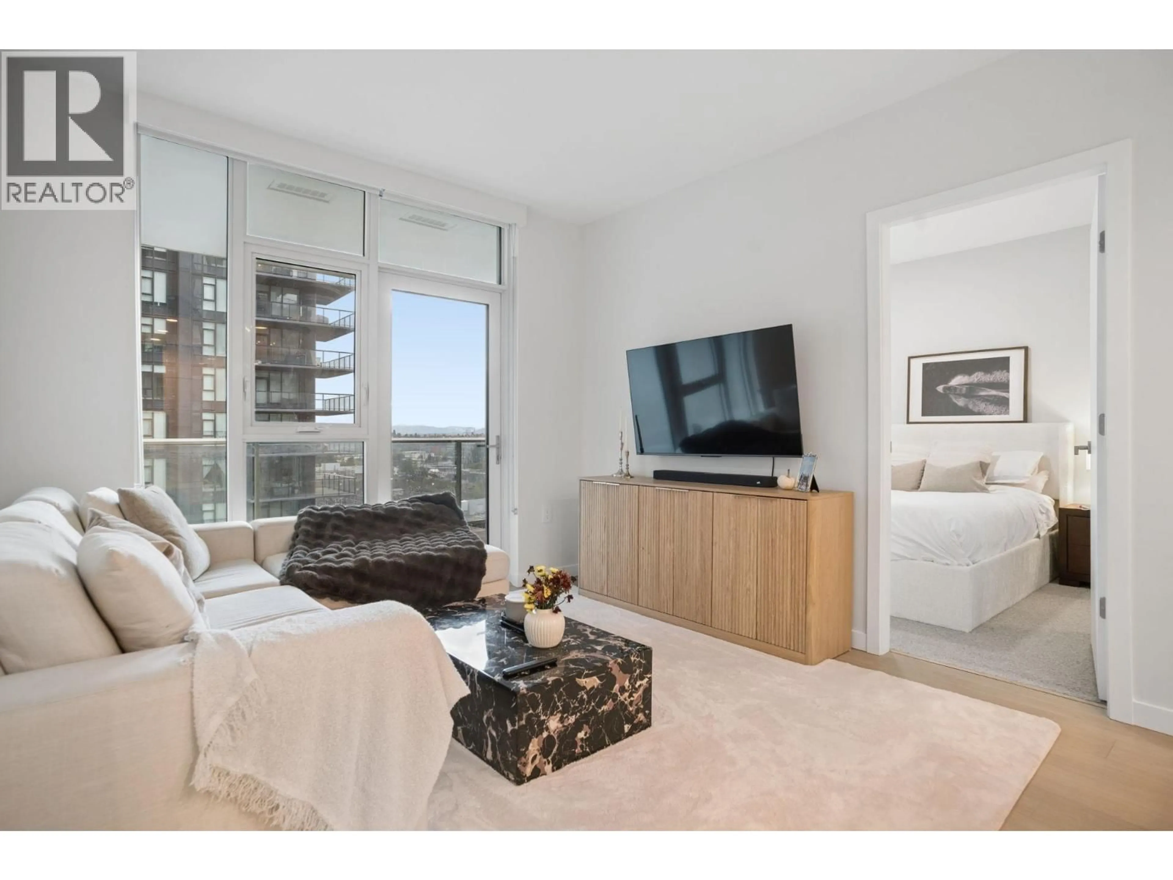 Living room with furniture, unknown for 1203 - 4168 LOUGHEED HIGHWAY, Burnaby British Columbia V5C0N9