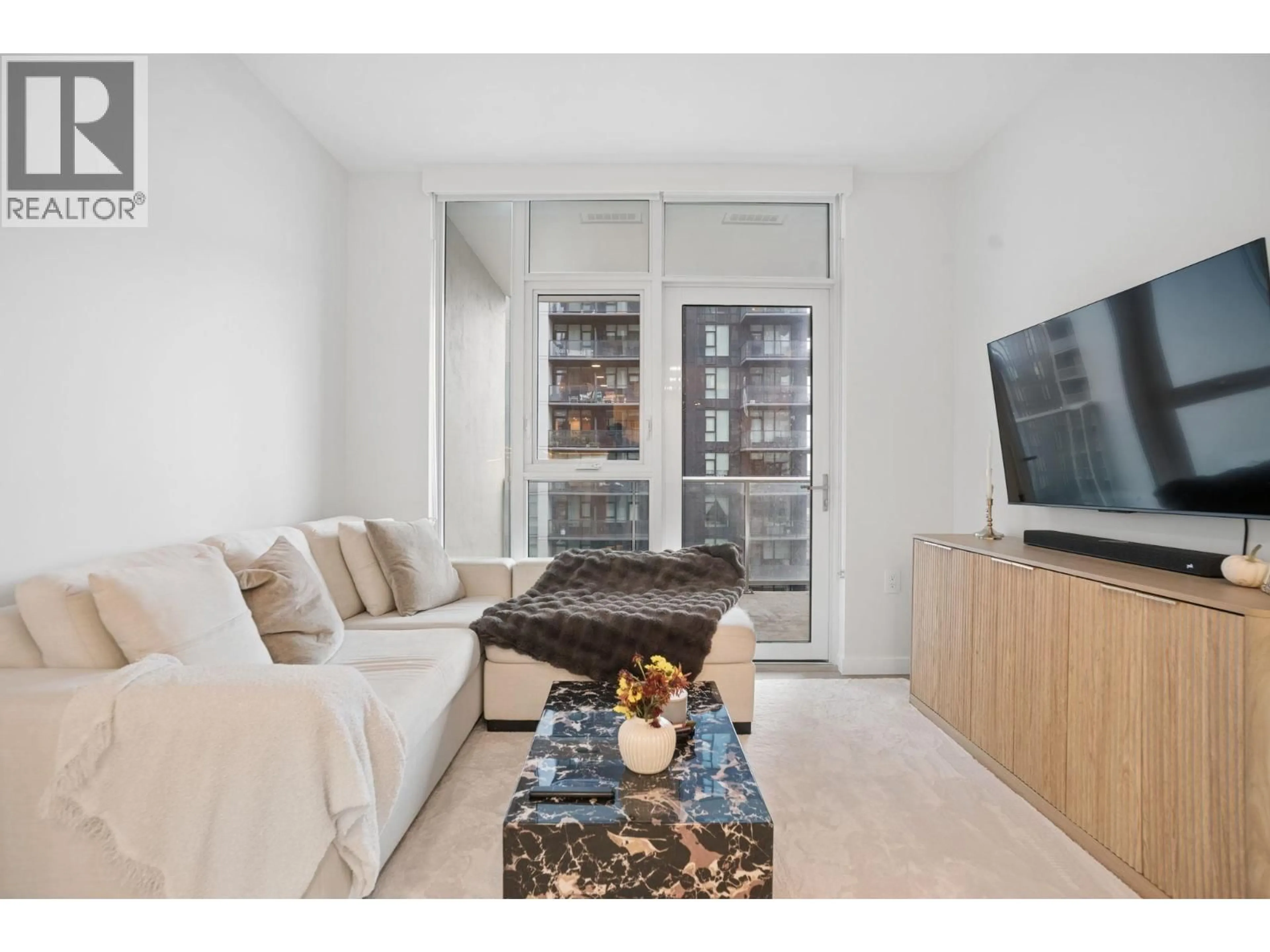Living room with furniture, unknown for 1203 - 4168 LOUGHEED HIGHWAY, Burnaby British Columbia V5C0N9