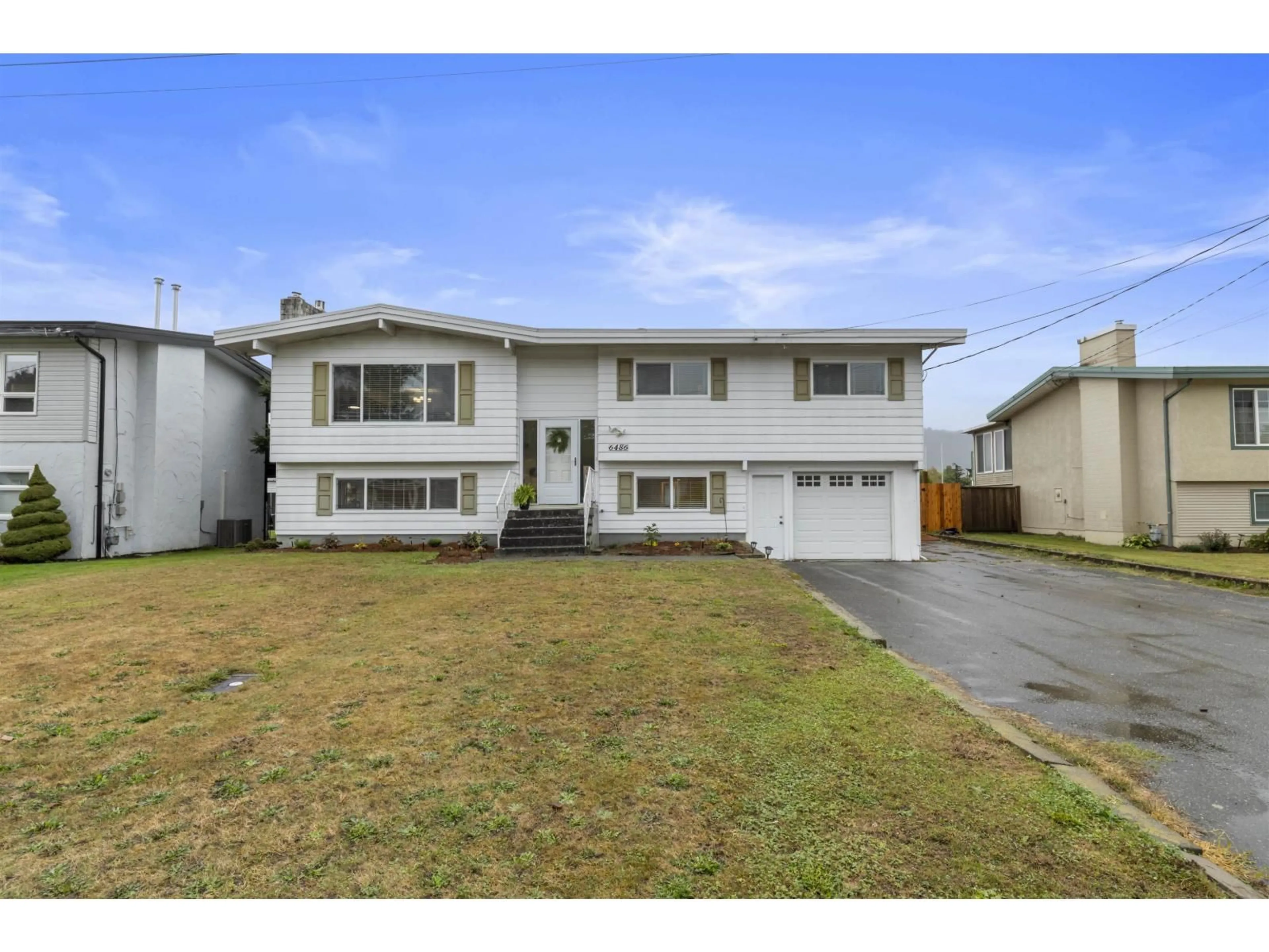 Home with vinyl exterior material, street for 6486 FERN STREET, Chilliwack British Columbia V2R1T6