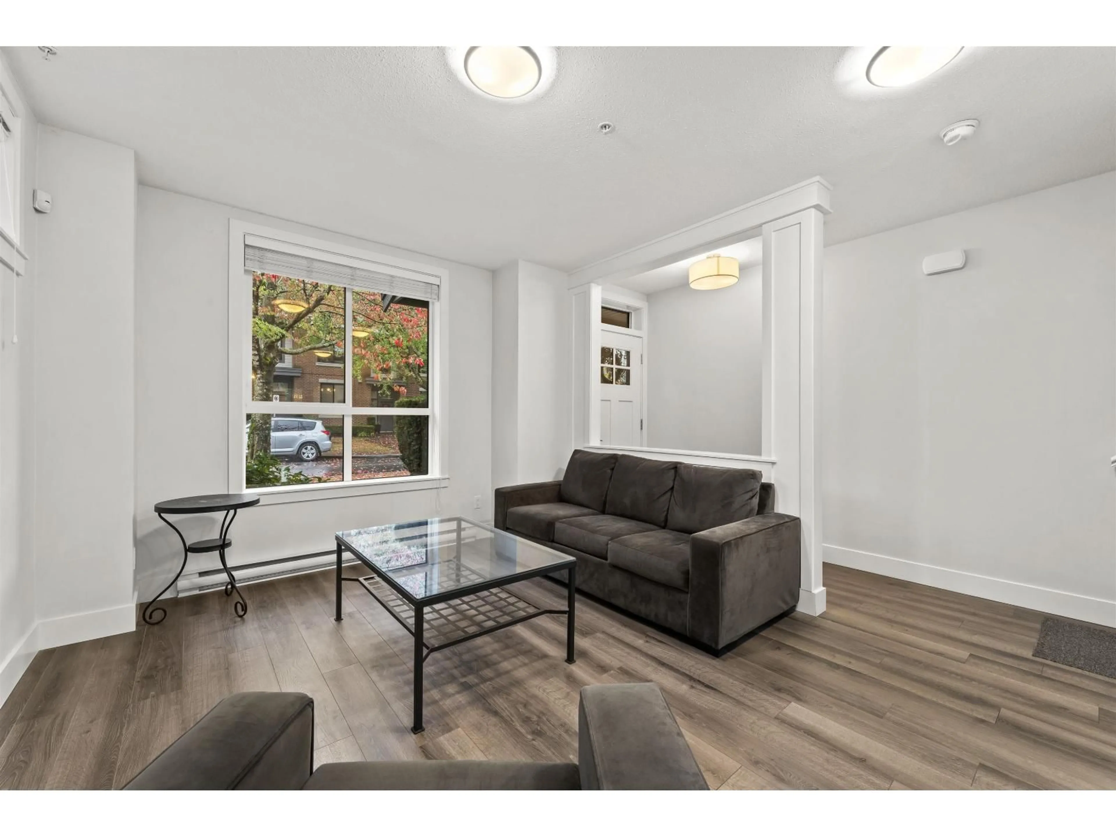 Living room with furniture, wood/laminate floor for 6 - 2988 151 STREET, Surrey British Columbia V4P0G1
