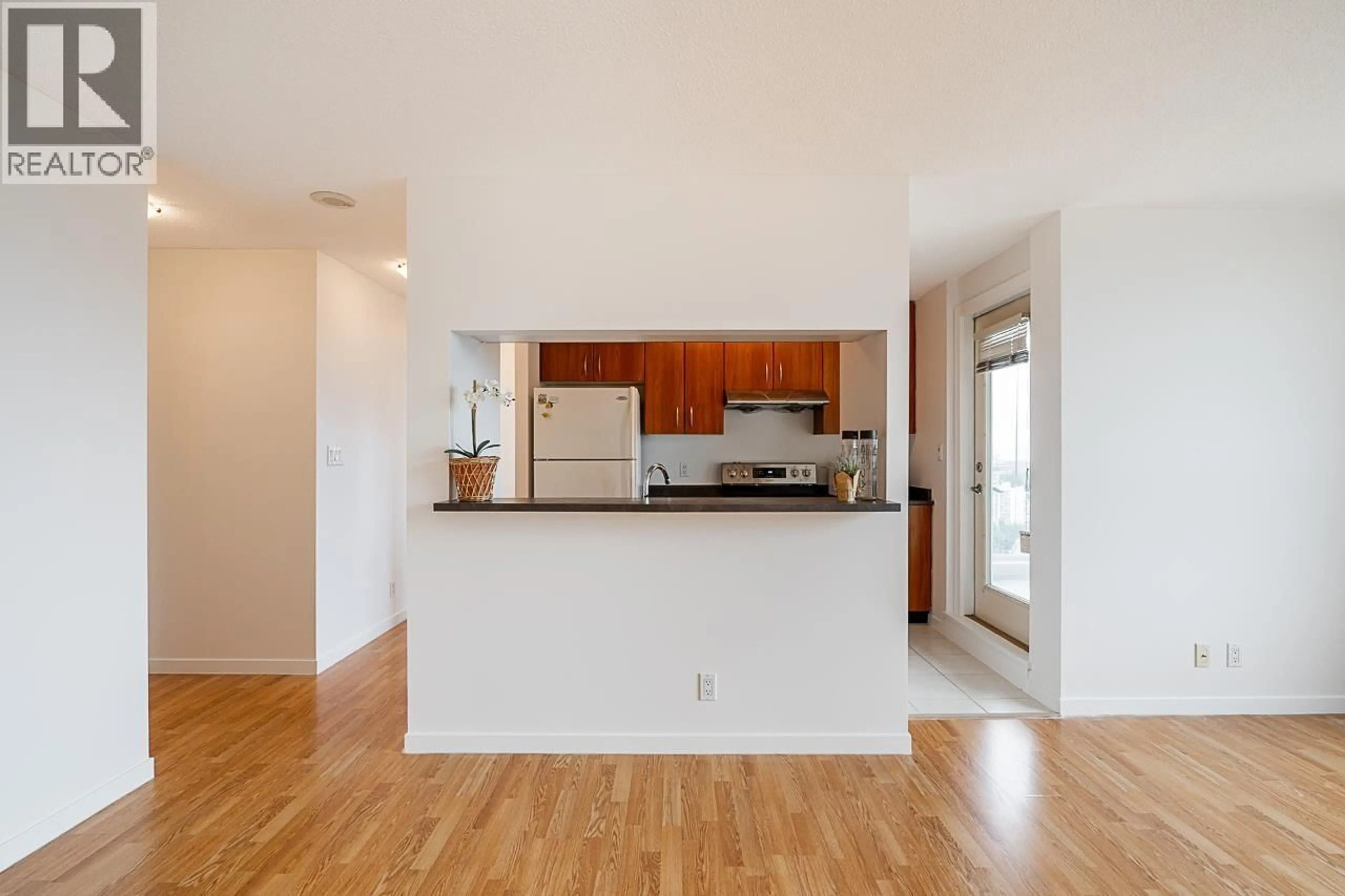 Open concept kitchen, wood/laminate floor for 2409 - 3663 CROWLEY DRIVE, Vancouver British Columbia V5R6H4