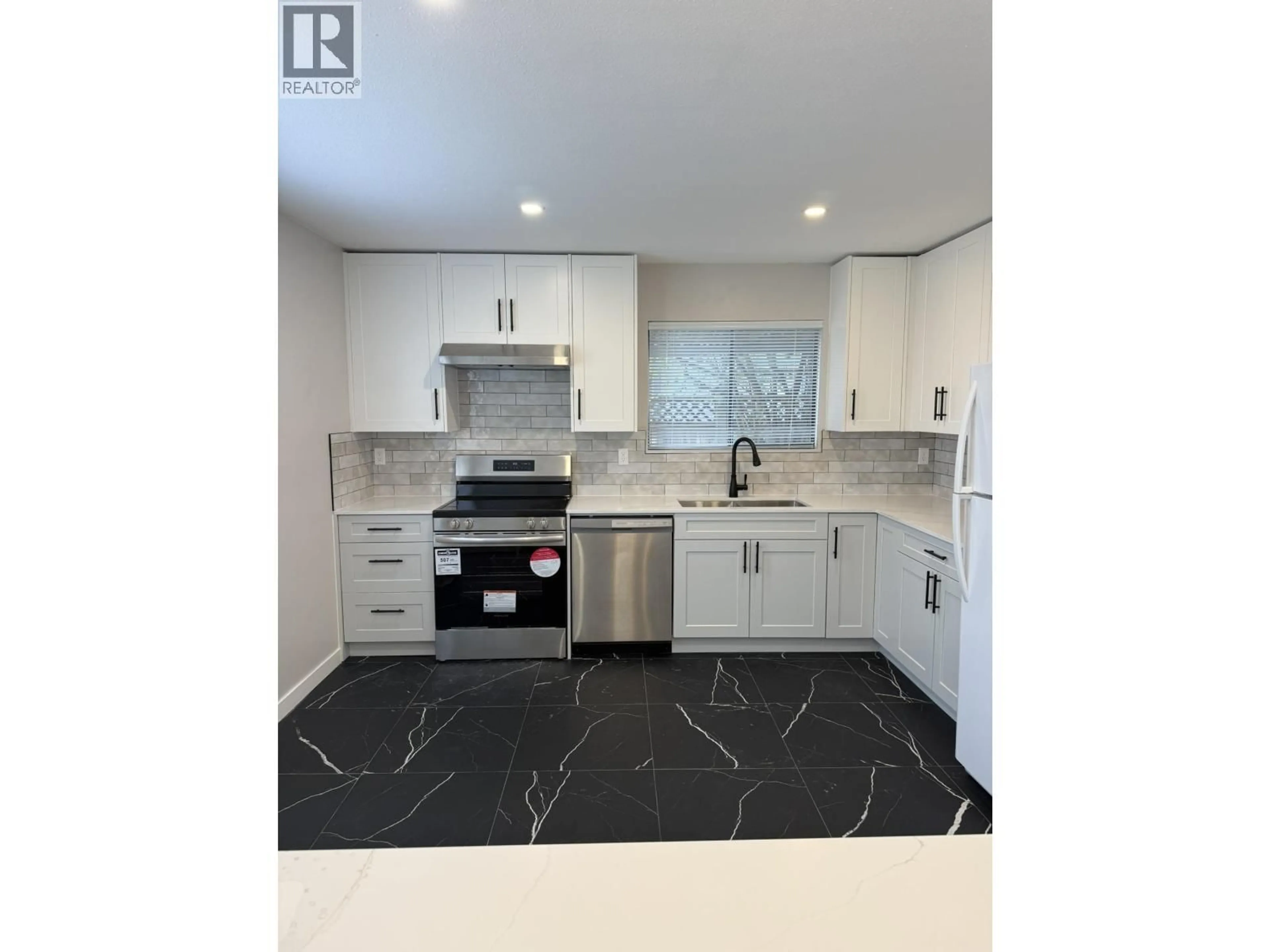 Open concept kitchen, ceramic/tile floor for 1965 FLYNN CRESCENT, Coquitlam British Columbia V3E1W6