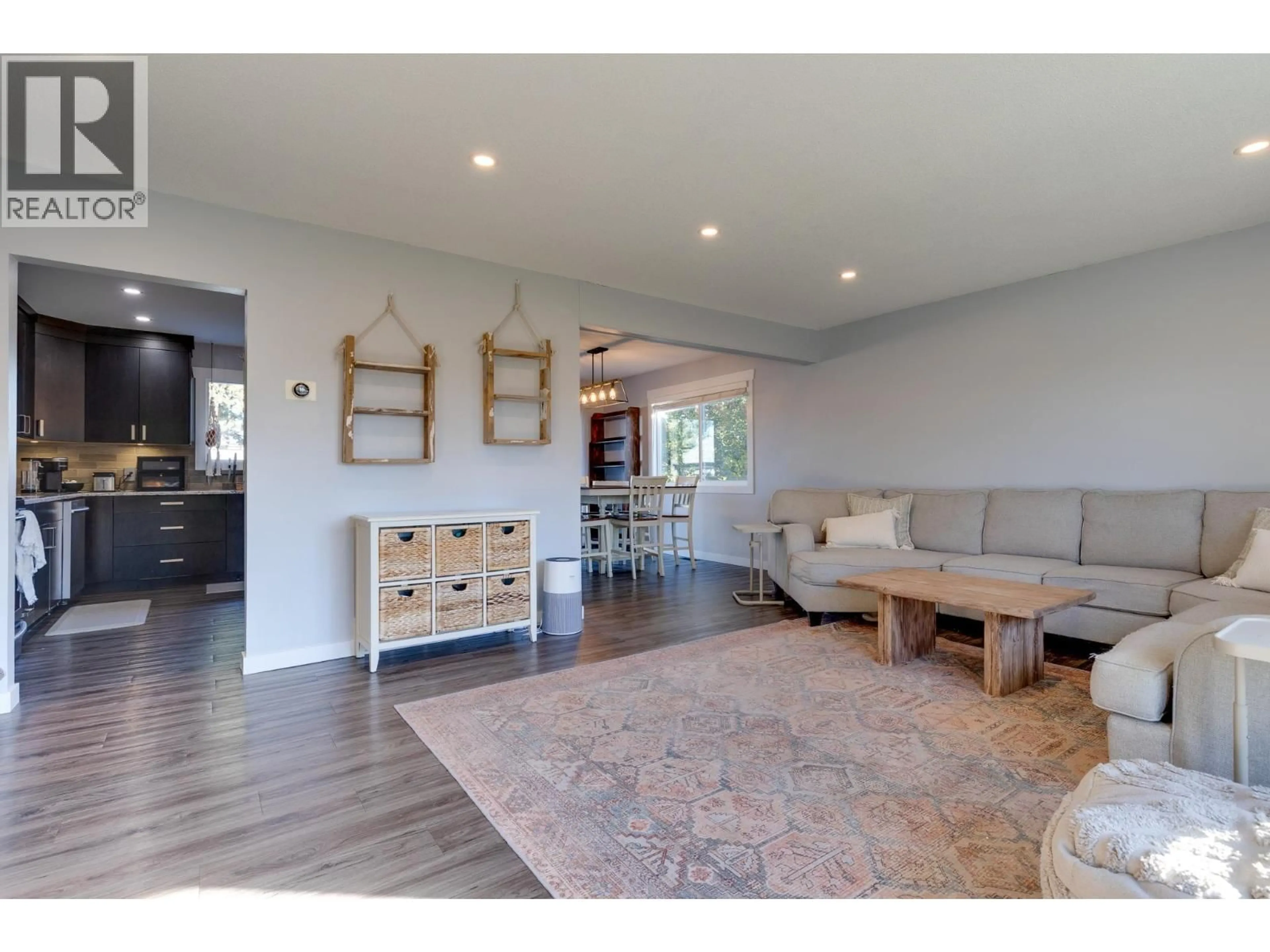 Living room with furniture, wood/laminate floor for 534 RUNNALLS AVENUE, Prince George British Columbia V2N1Y9