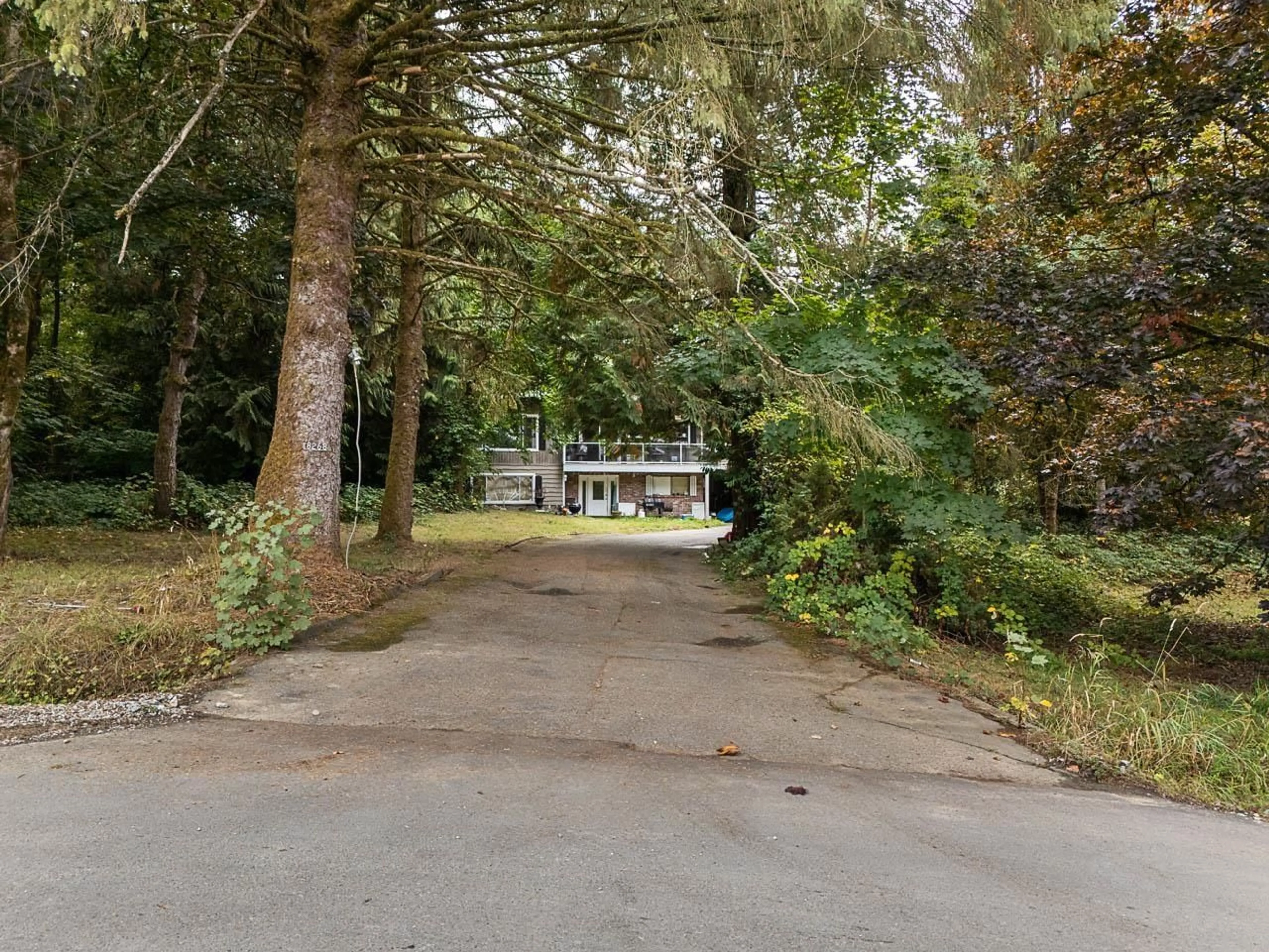 A pic from outside/outdoor area/front of a property/back of a property/a pic from drone, street for 18268 74 AVENUE, Surrey British Columbia V4N6C1