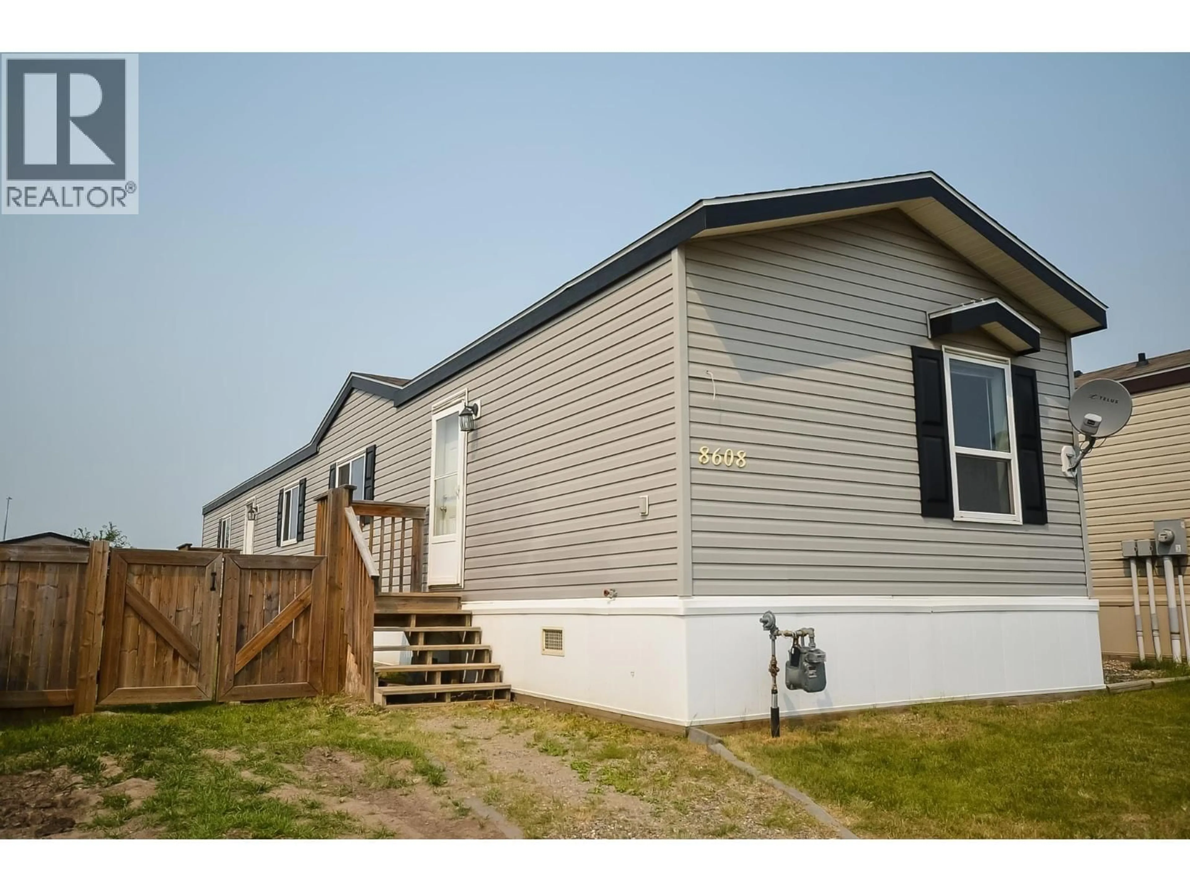 Home with vinyl exterior material, unknown for 8608 79A STREET, Fort St. John British Columbia V1J0H7