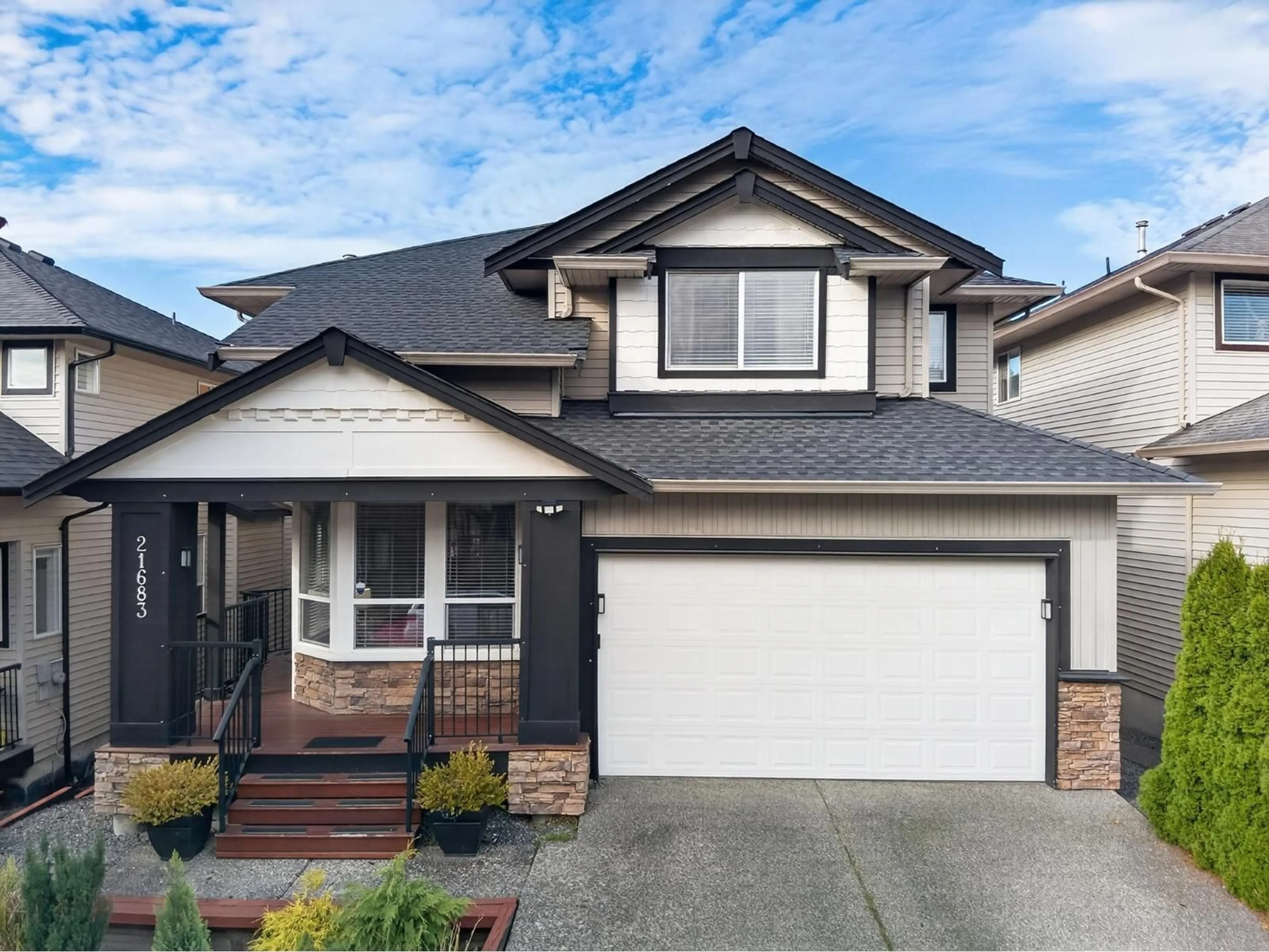 Home with vinyl exterior material, street for 21683 89A AVENUE, Langley British Columbia V1M4C7