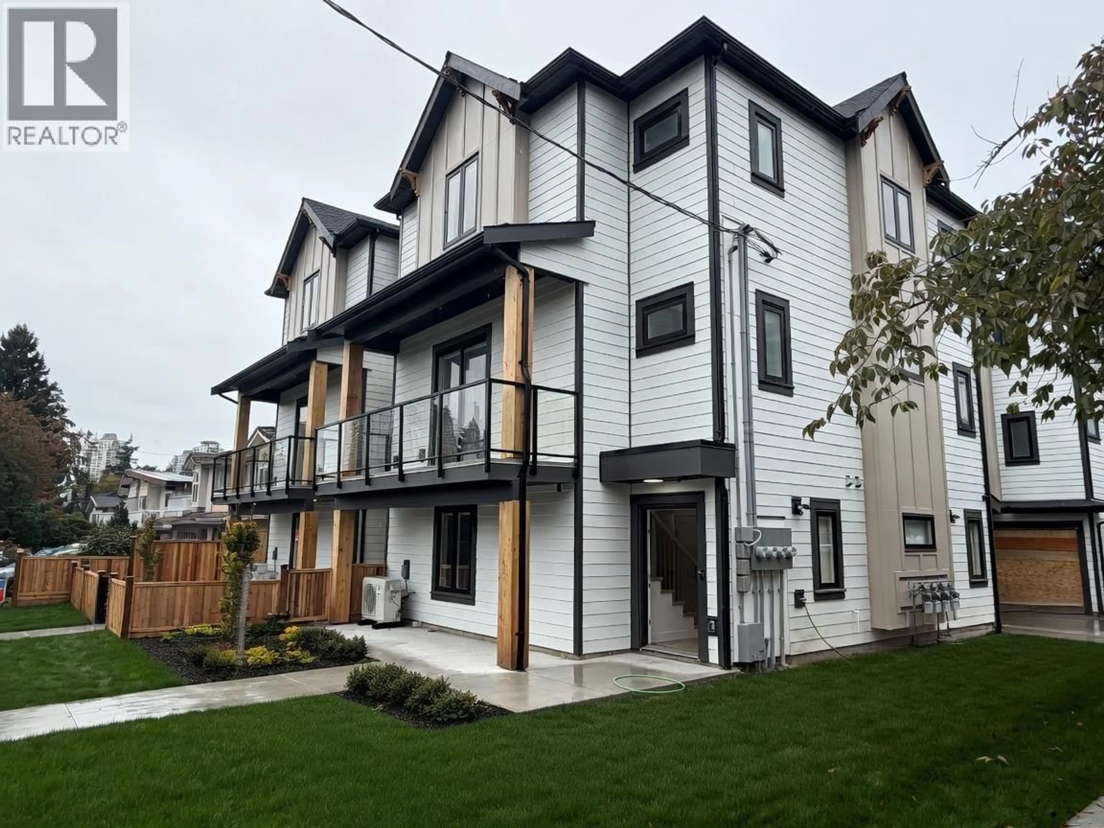 Home with vinyl exterior material, street for 2 - 7497 HOLLY STREET, Burnaby British Columbia V5E2C3