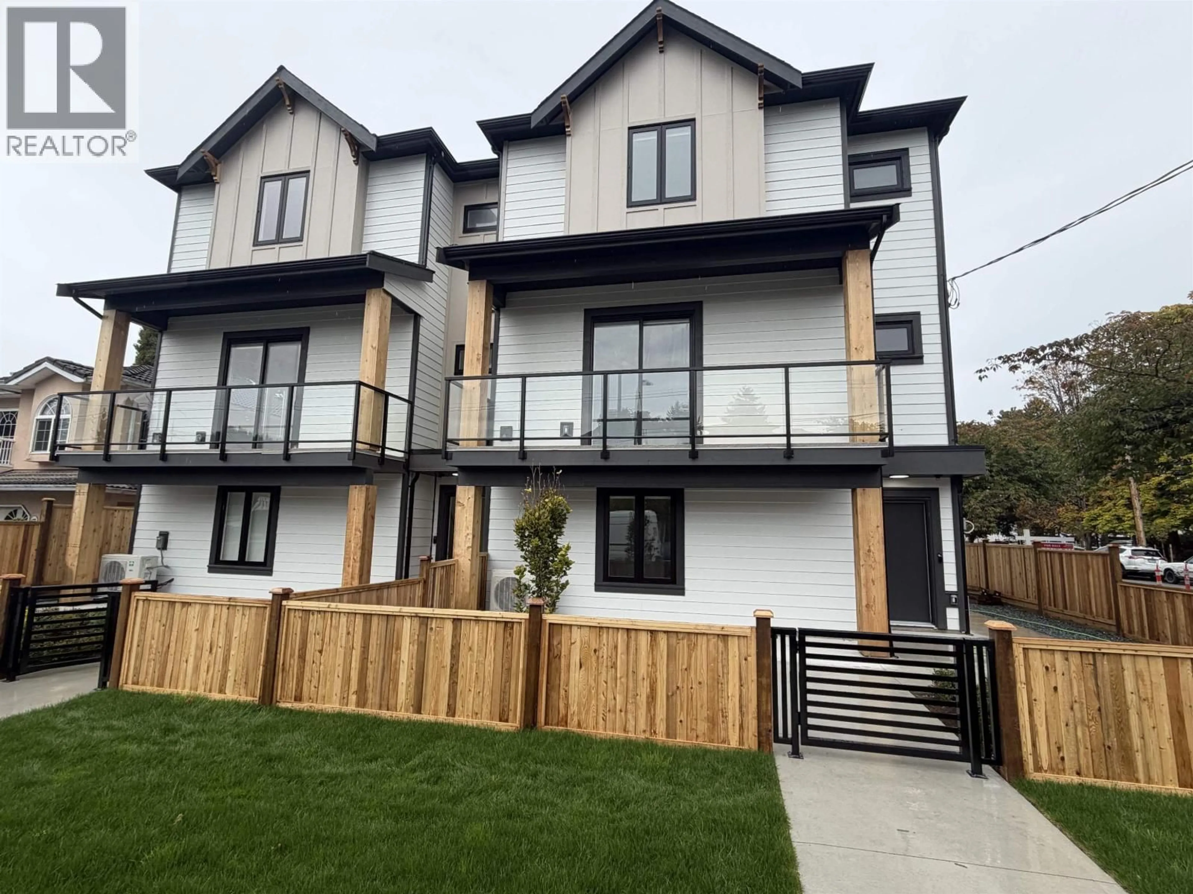 A pic from outside/outdoor area/front of a property/back of a property/a pic from drone, street for 2 - 7497 HOLLY STREET, Burnaby British Columbia V5E2C3