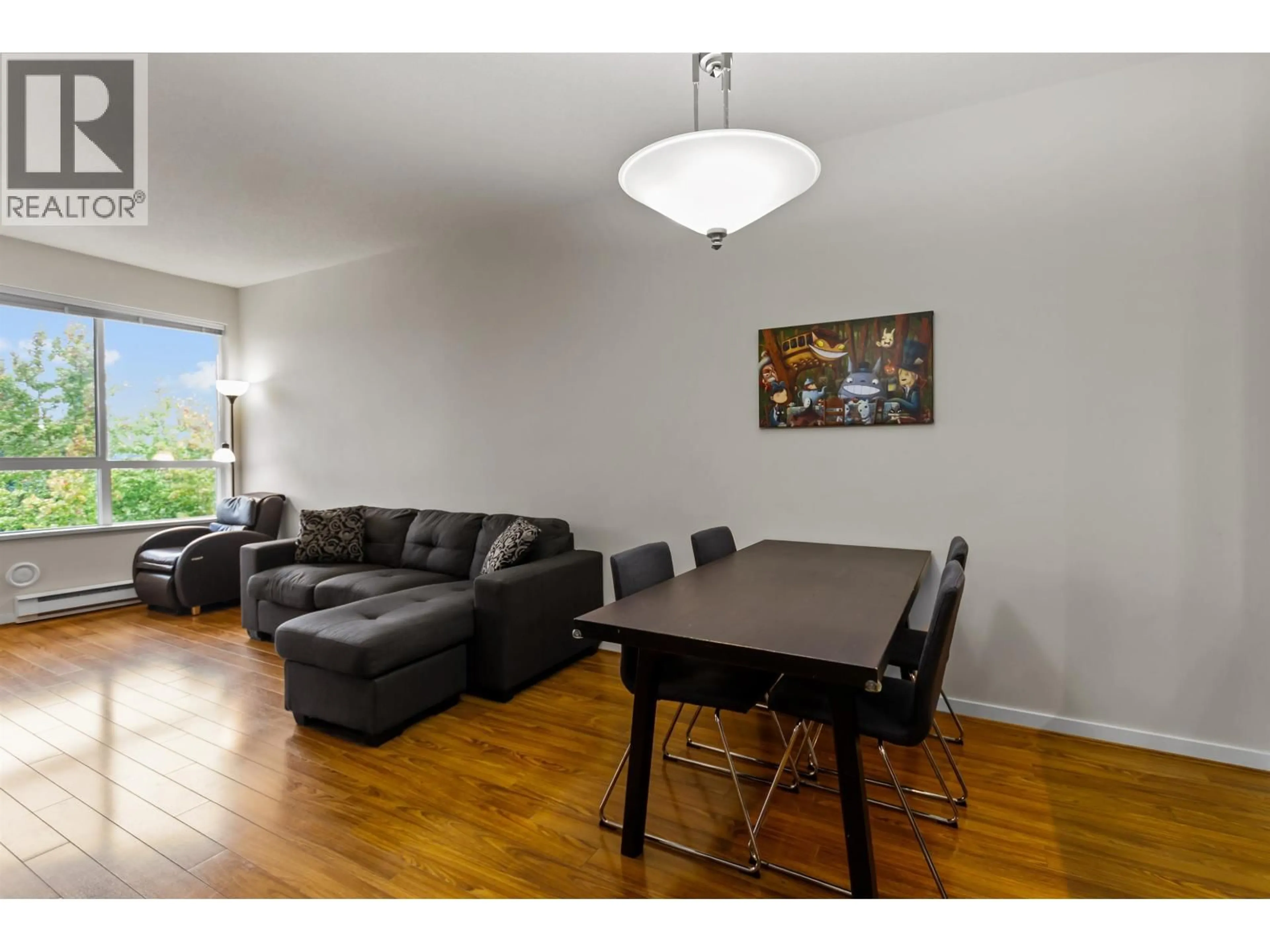 Living room with furniture, wood/laminate floor for 408 - 3651 FOSTER AVENUE, Vancouver British Columbia V5R0A2