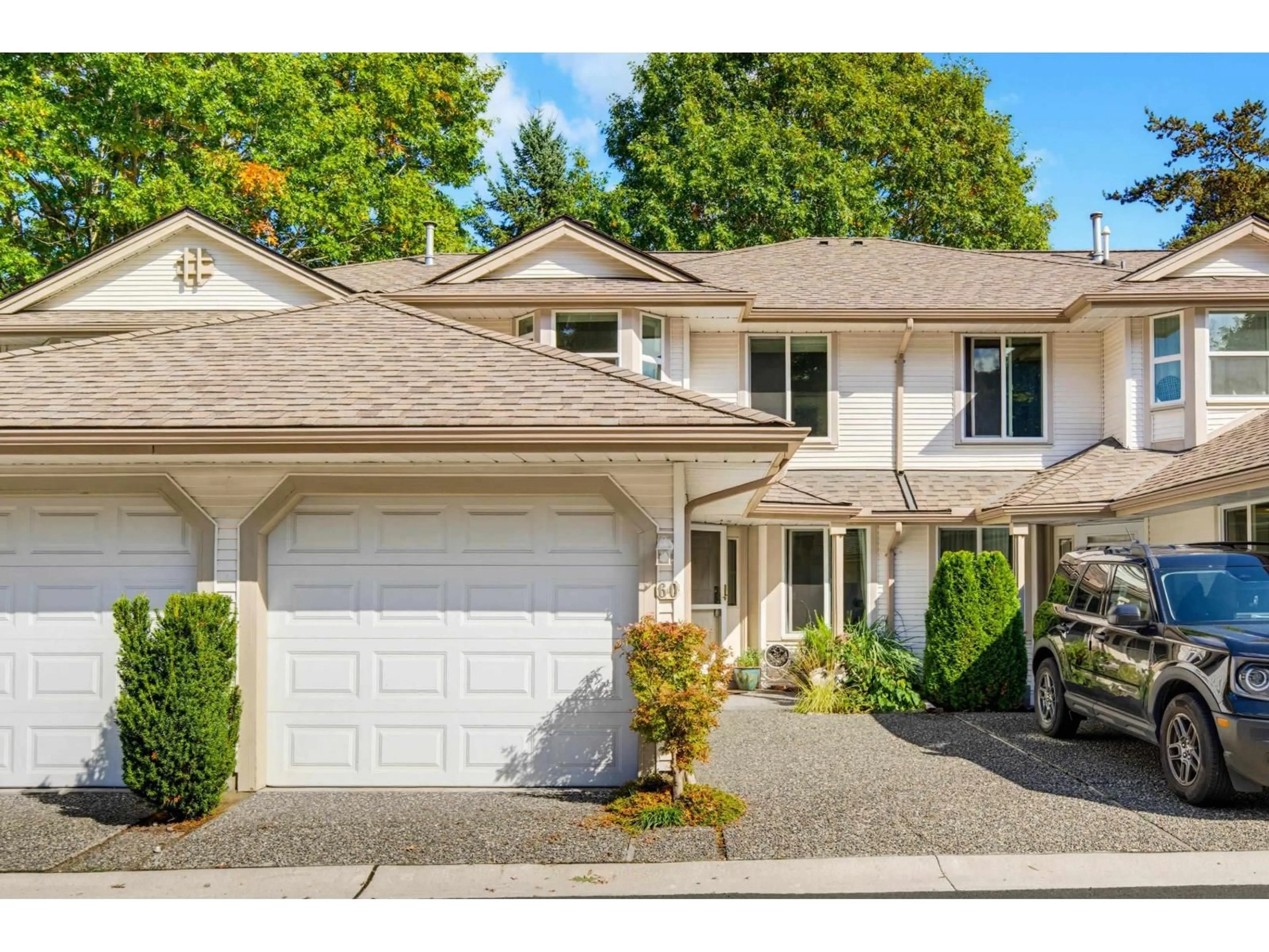 Home with vinyl exterior material, street for 60 - 9045 WALNUT GROVE DRIVE, Langley British Columbia V1M2E1