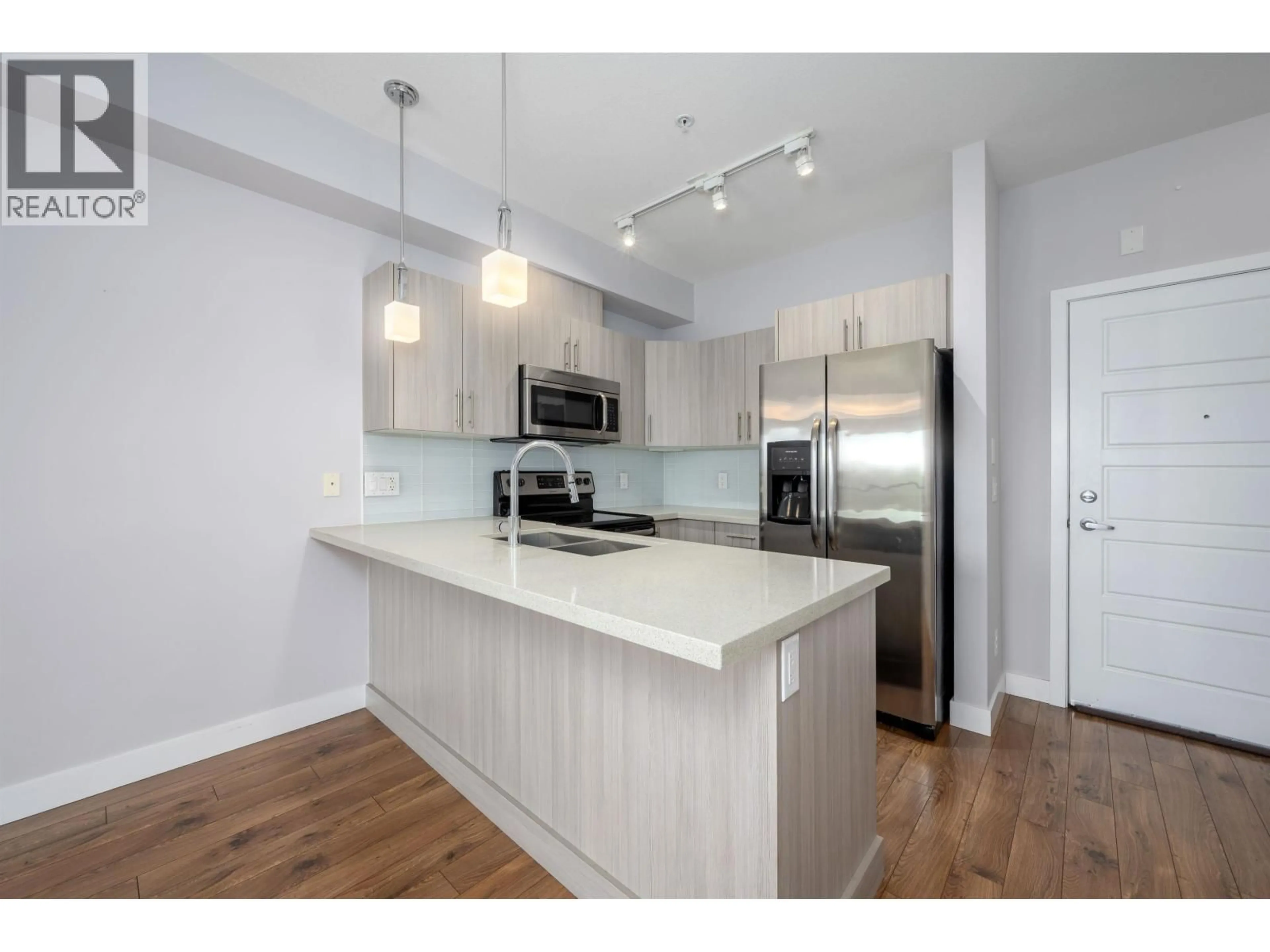 Open concept kitchen, wood/laminate floor for 311 - 12070 227 STREET, Maple Ridge British Columbia V2X9H2