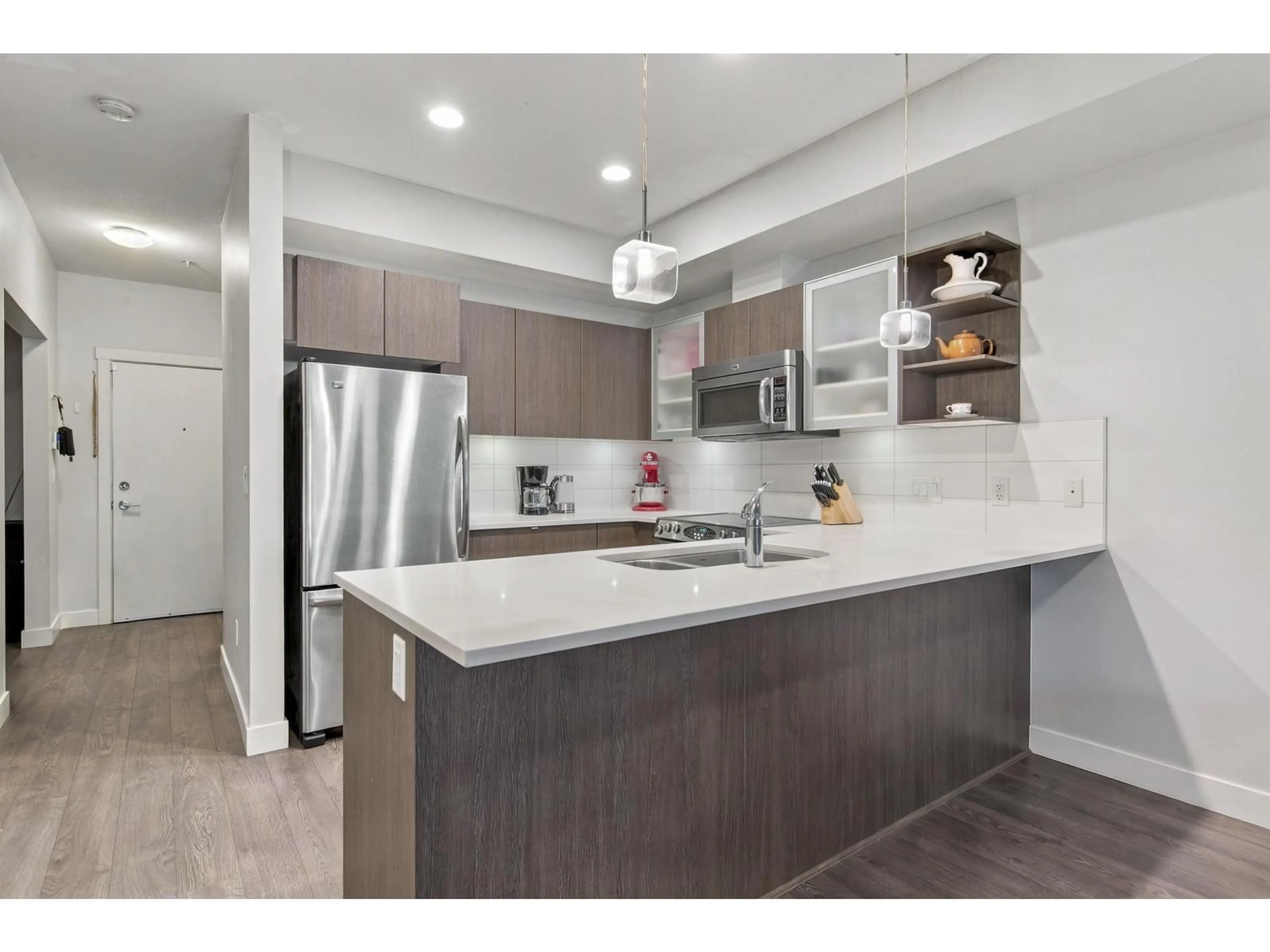 Open concept kitchen, unknown for 105 - 19936 56 AVENUE, Langley British Columbia V3A0E1