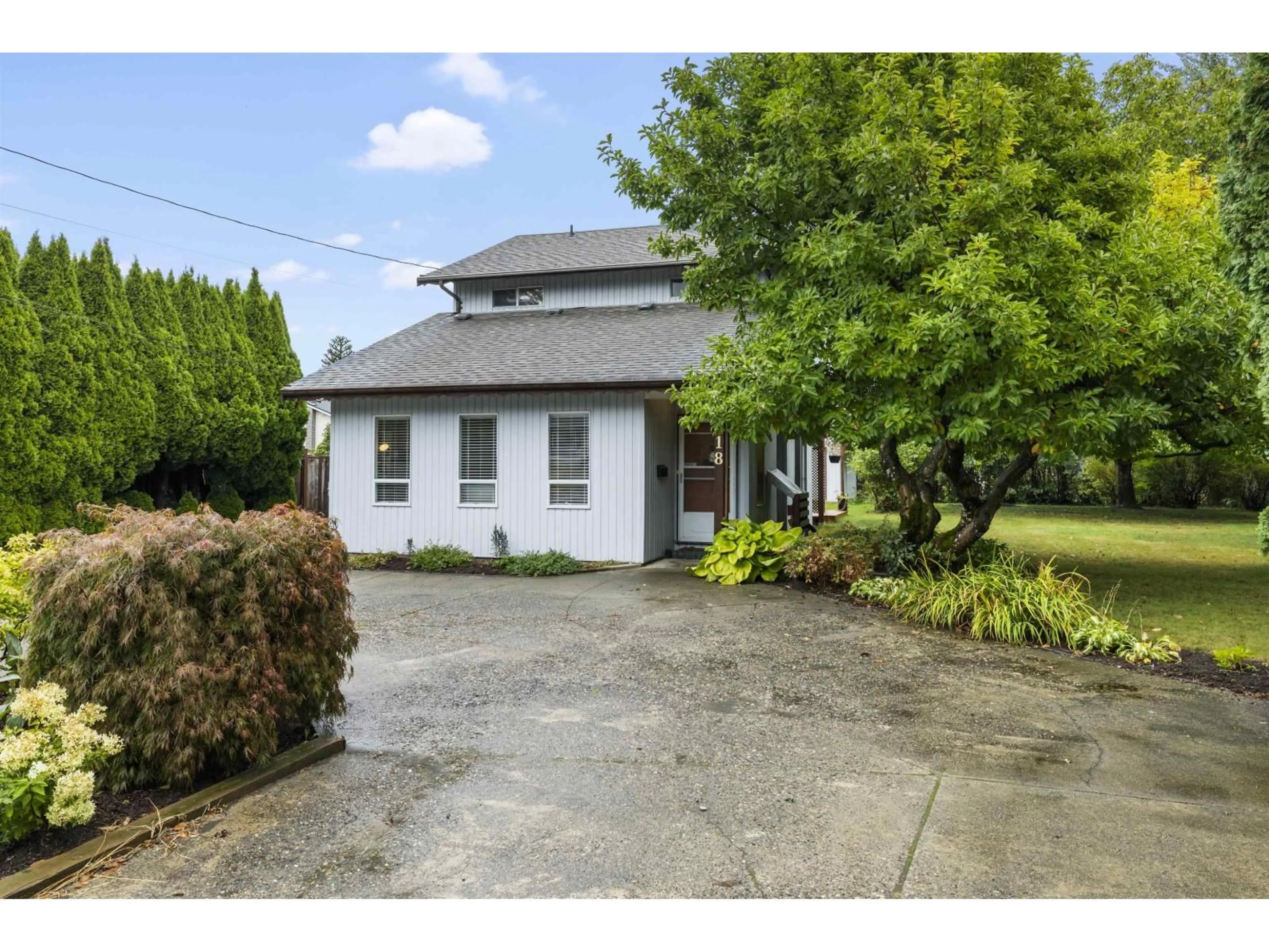 A pic from outside/outdoor area/front of a property/back of a property/a pic from drone, street for 9418 MCNAUGHT ROAD, Chilliwack British Columbia V2P6E9