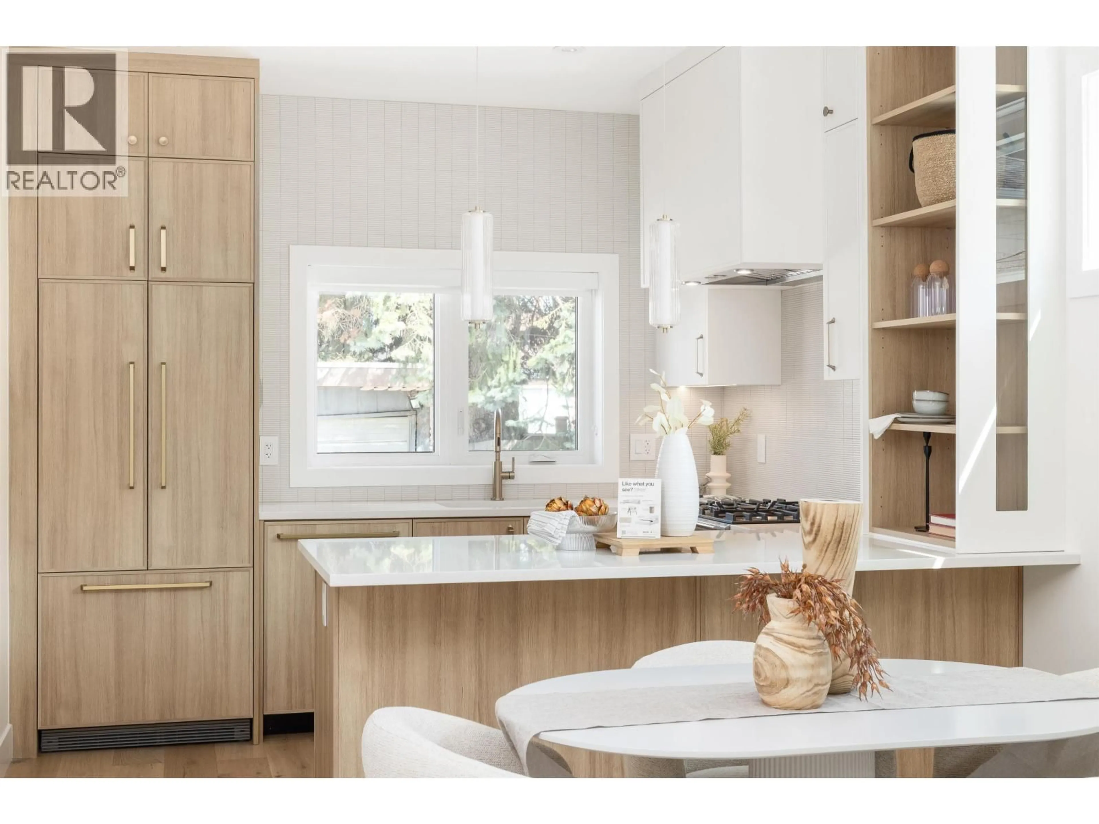 Contemporary kitchen, wood/laminate floor for 3143 19 AVENUE, Vancouver British Columbia V5M2T2