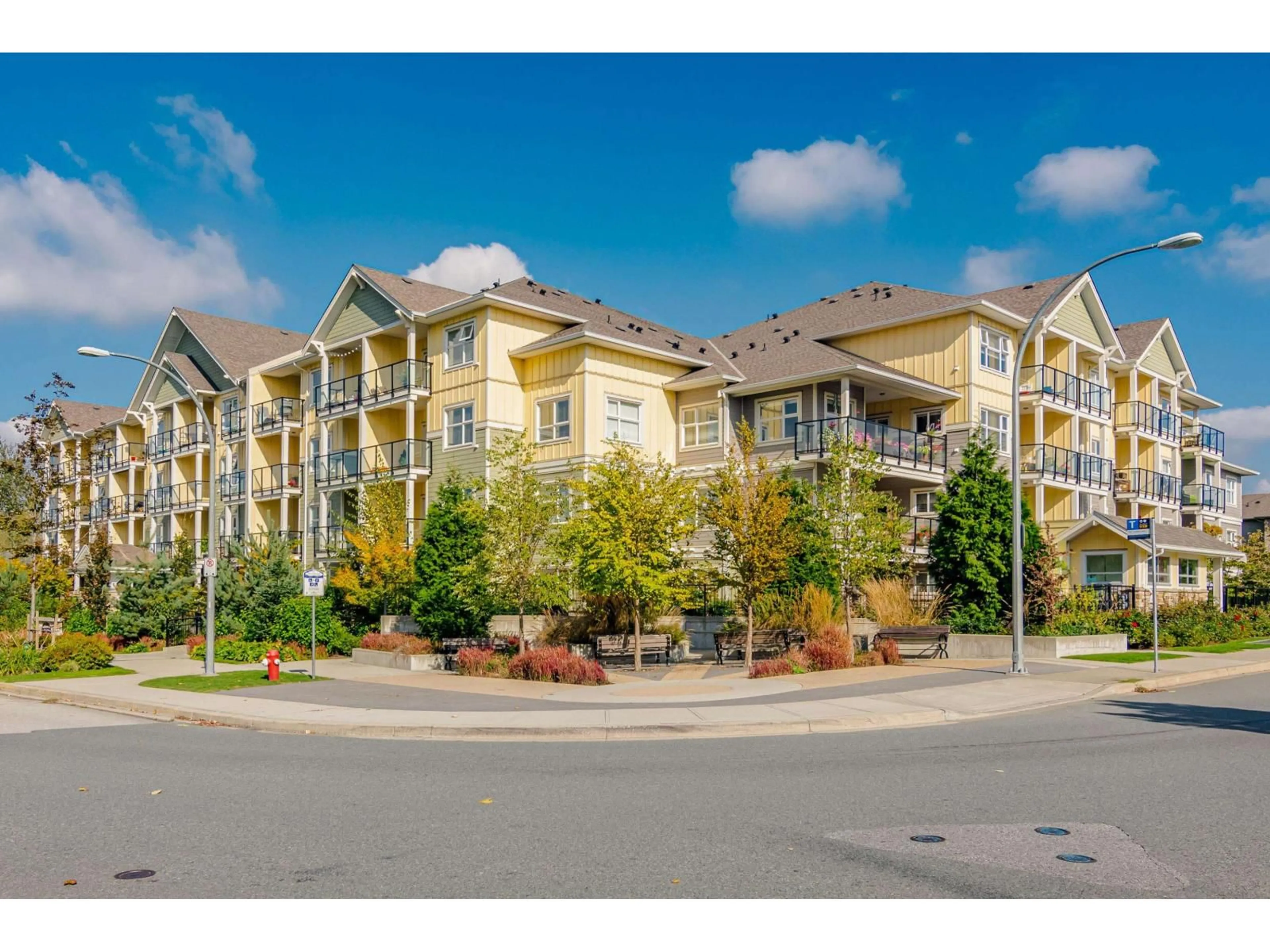 A pic from outside/outdoor area/front of a property/back of a property/a pic from drone, unknown for 208 - 5020 221A STREET, Langley British Columbia V2Y0V5