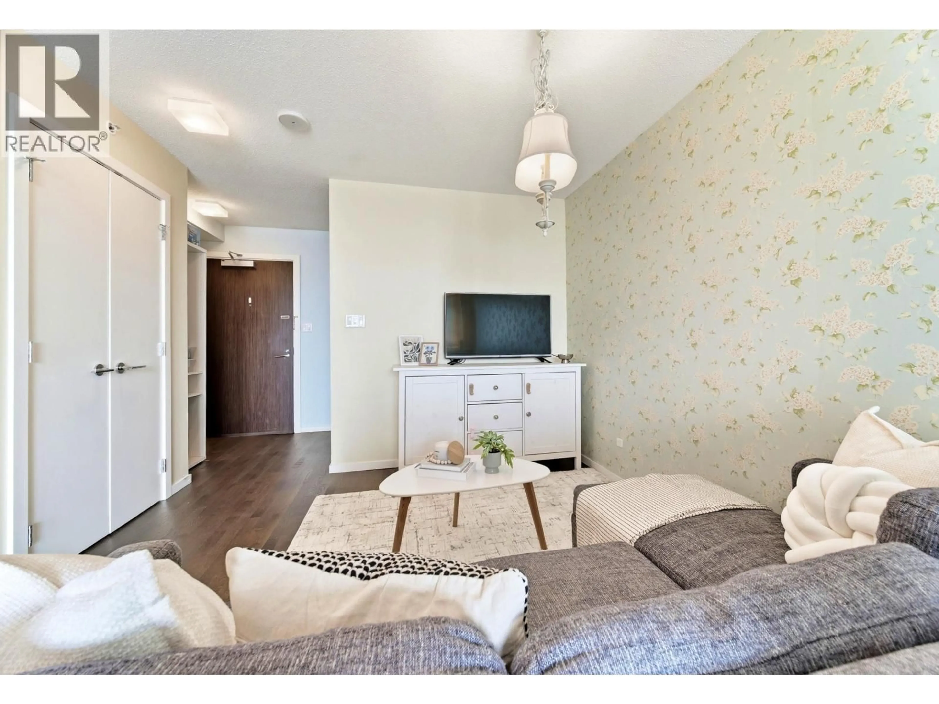 Living room with furniture, wood/laminate floor for 1209 - 7888 ACKROYD ROAD, Richmond British Columbia V6X0M9