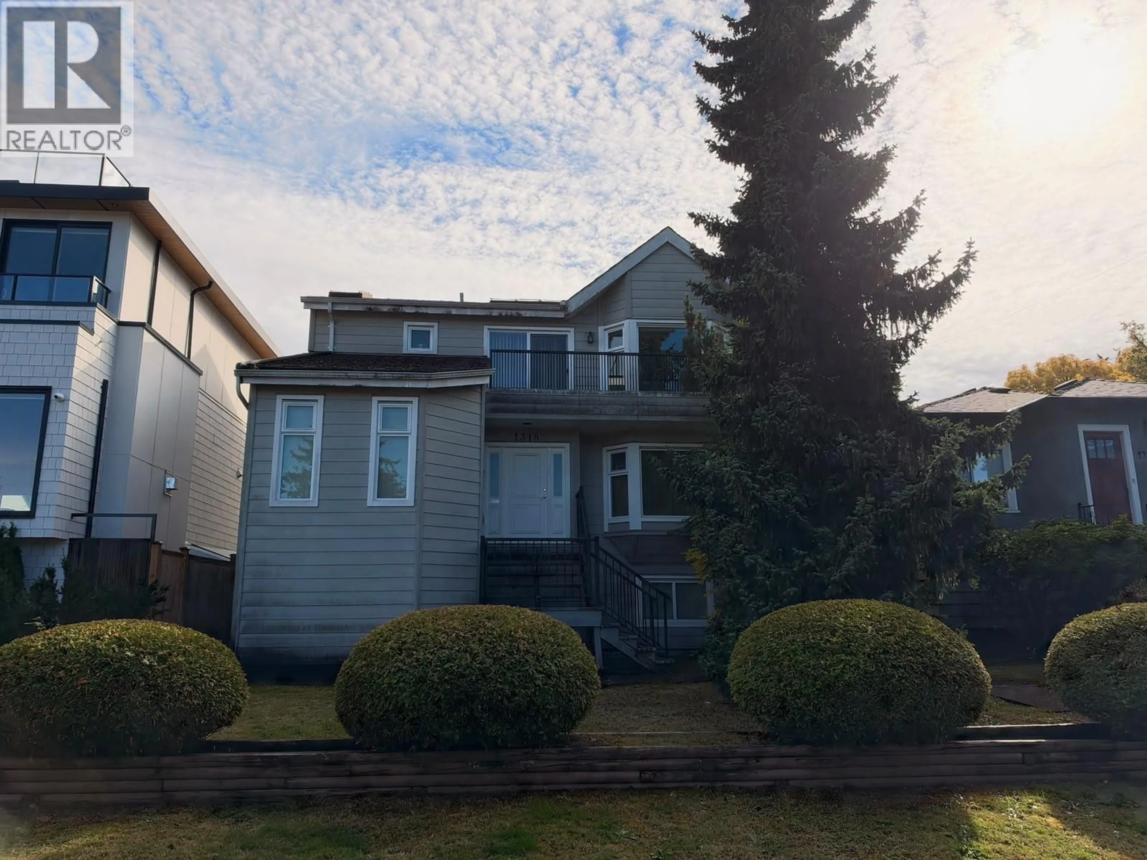 Home with vinyl exterior material, street for 1318 34TH AVENUE, Vancouver British Columbia V5W1A4