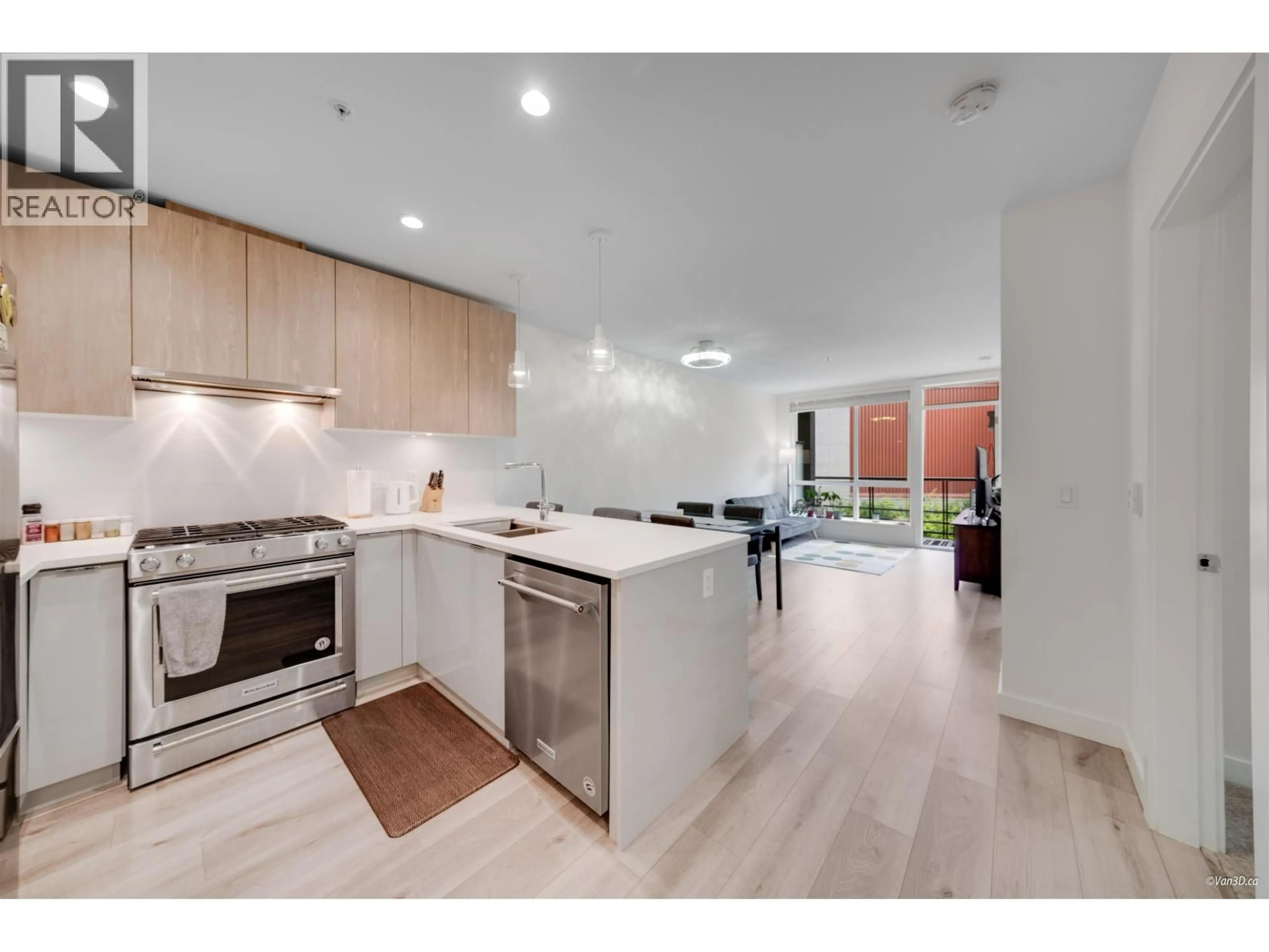 Open concept kitchen, unknown for 207 - 128 8TH STREET, North Vancouver British Columbia V7L1Y7