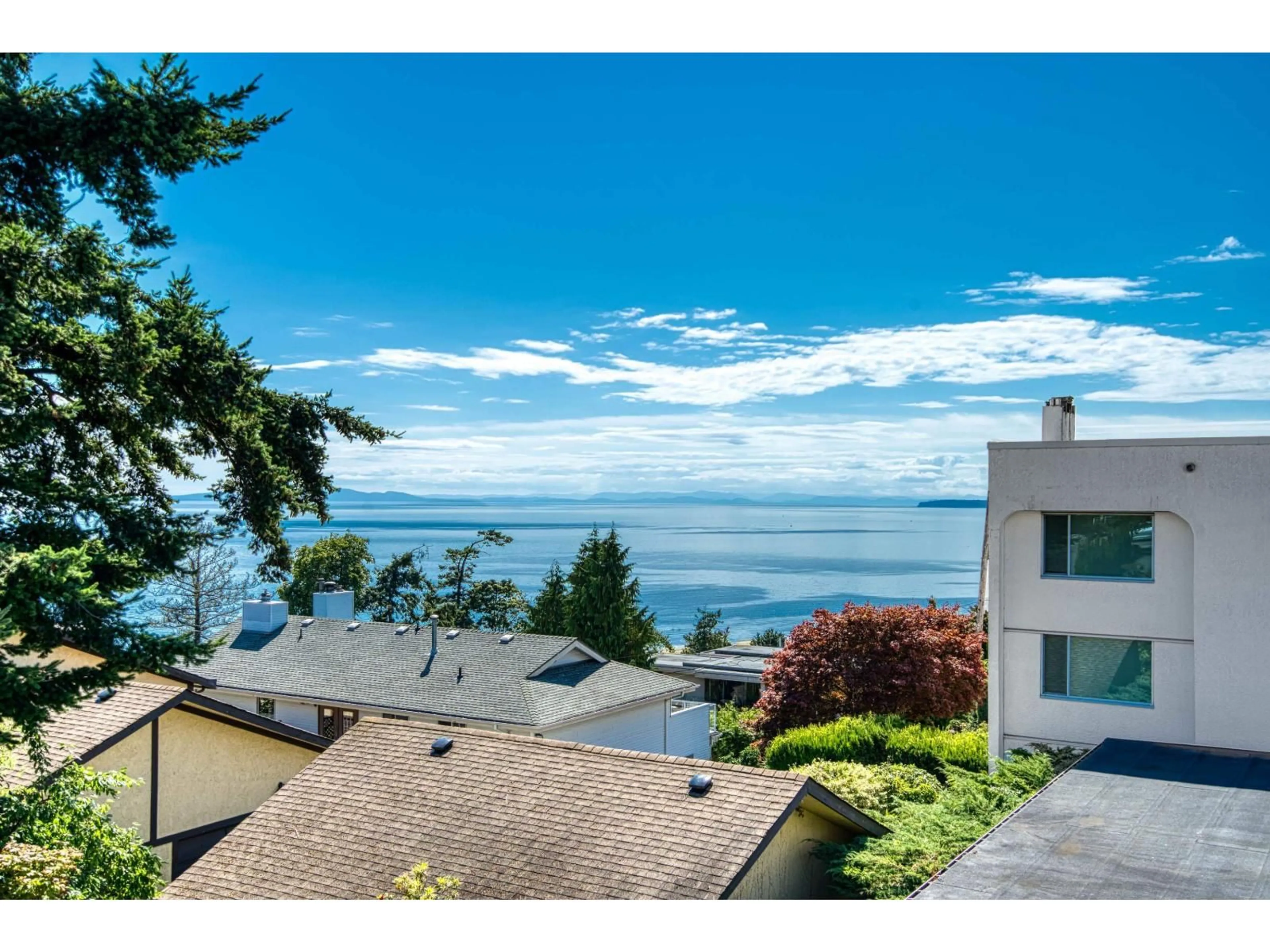 A pic from outside/outdoor area/front of a property/back of a property/a pic from drone, water/lake/river/ocean view for 206 - 15080 PROSPECT AVENUE, White Rock British Columbia V4B2B7
