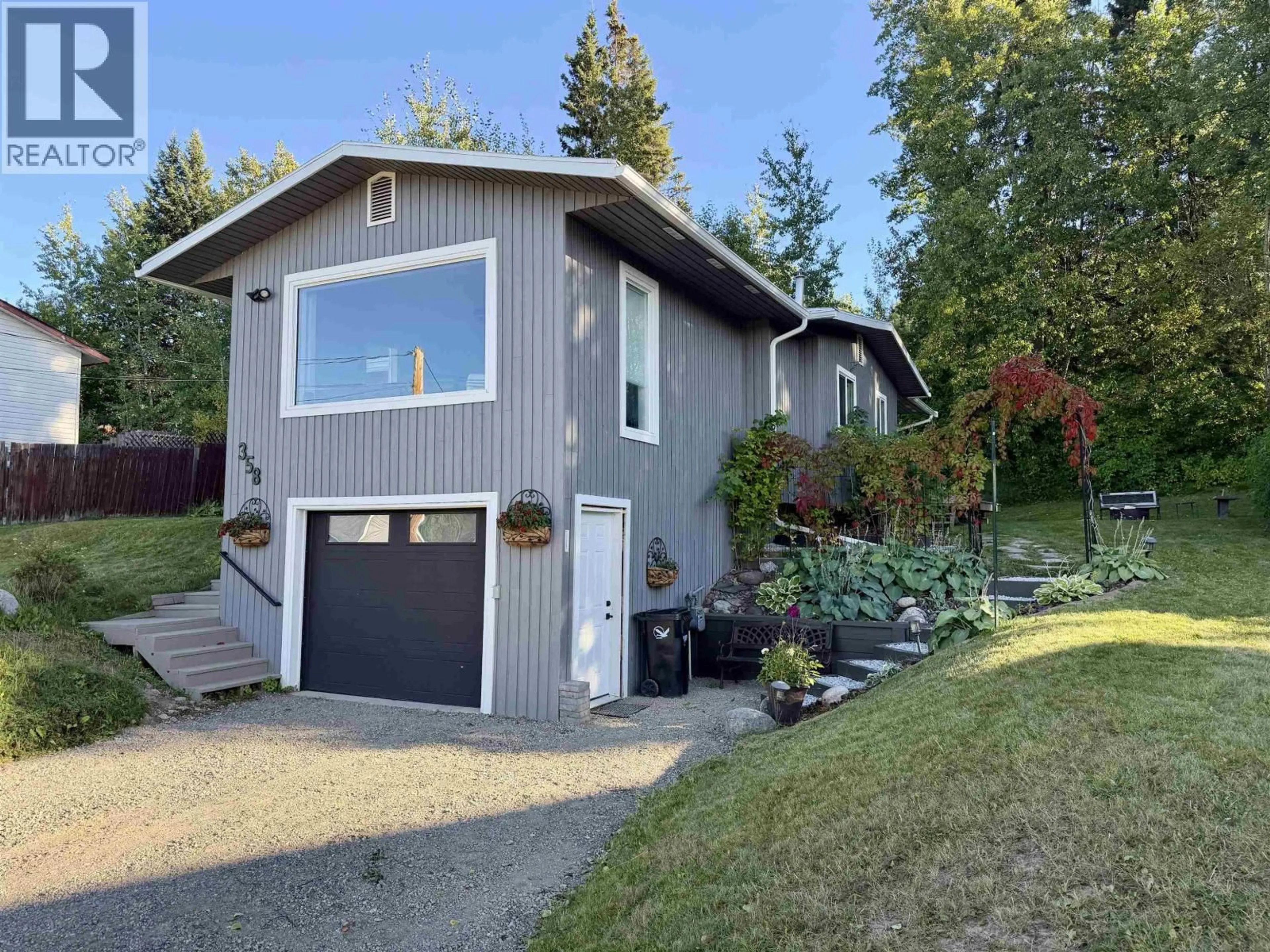 Home with vinyl exterior material, street for 358 W 5TH STREET, Vanderhoof British Columbia V0J3A0