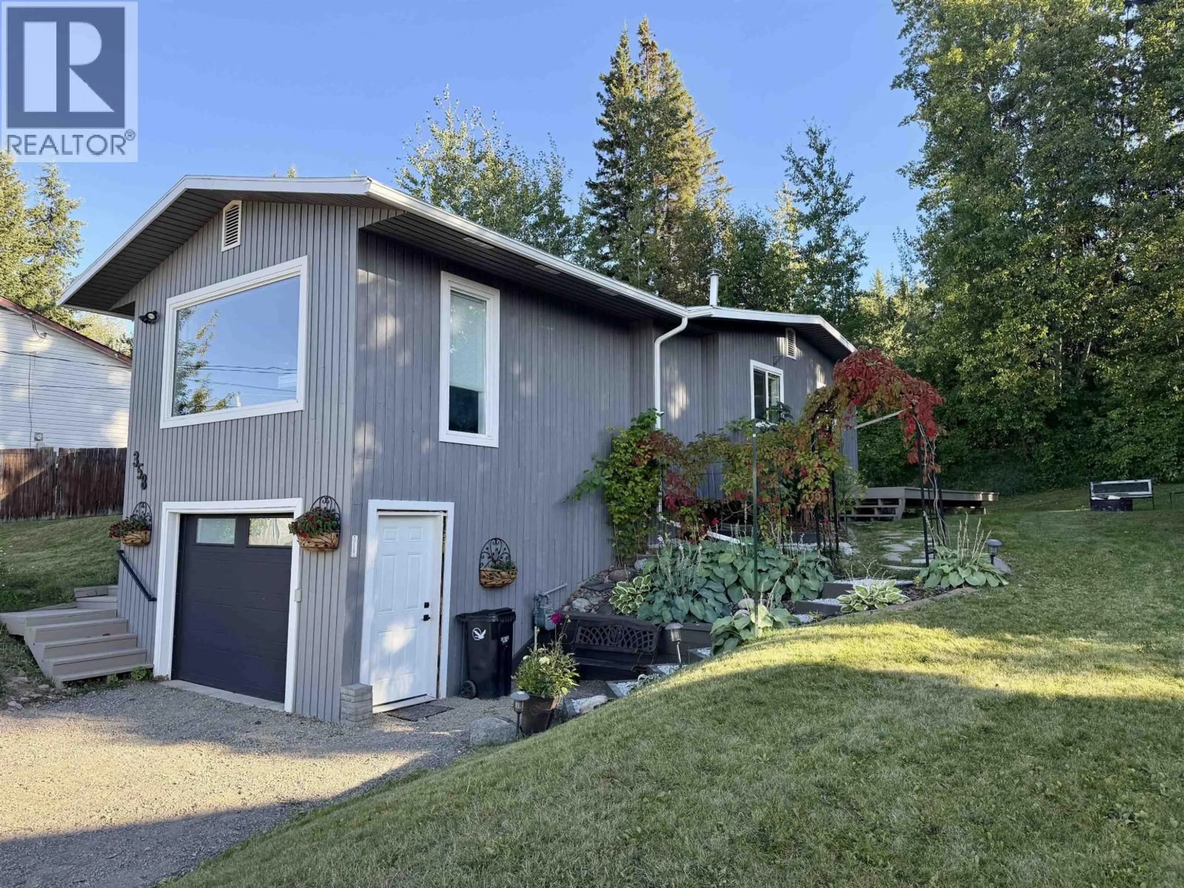 Home with vinyl exterior material, unknown for 358 W 5TH STREET, Vanderhoof British Columbia V0J3A0