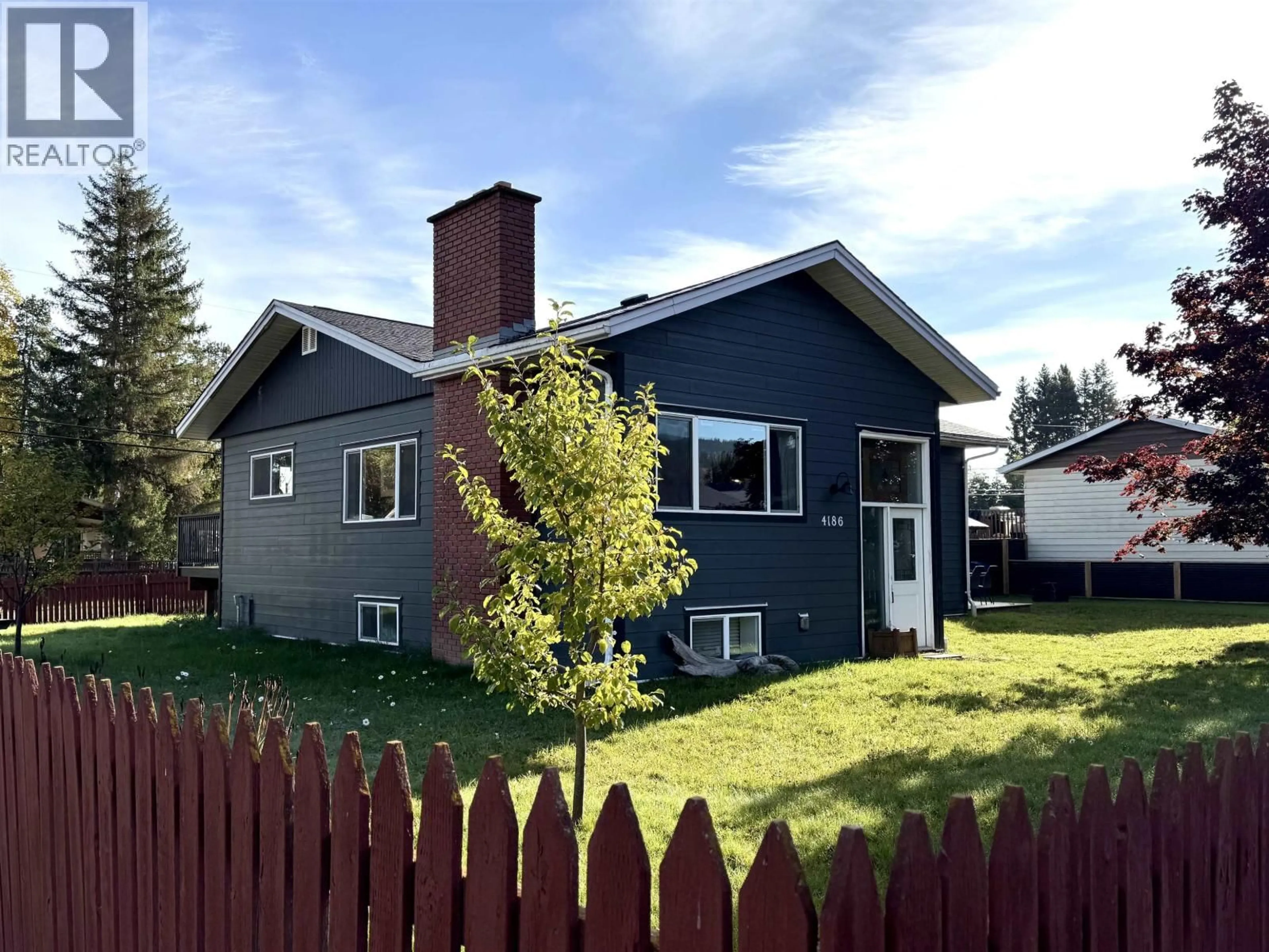 Home with vinyl exterior material, street for 4186 2ND AVENUE, Smithers British Columbia V0J2N0