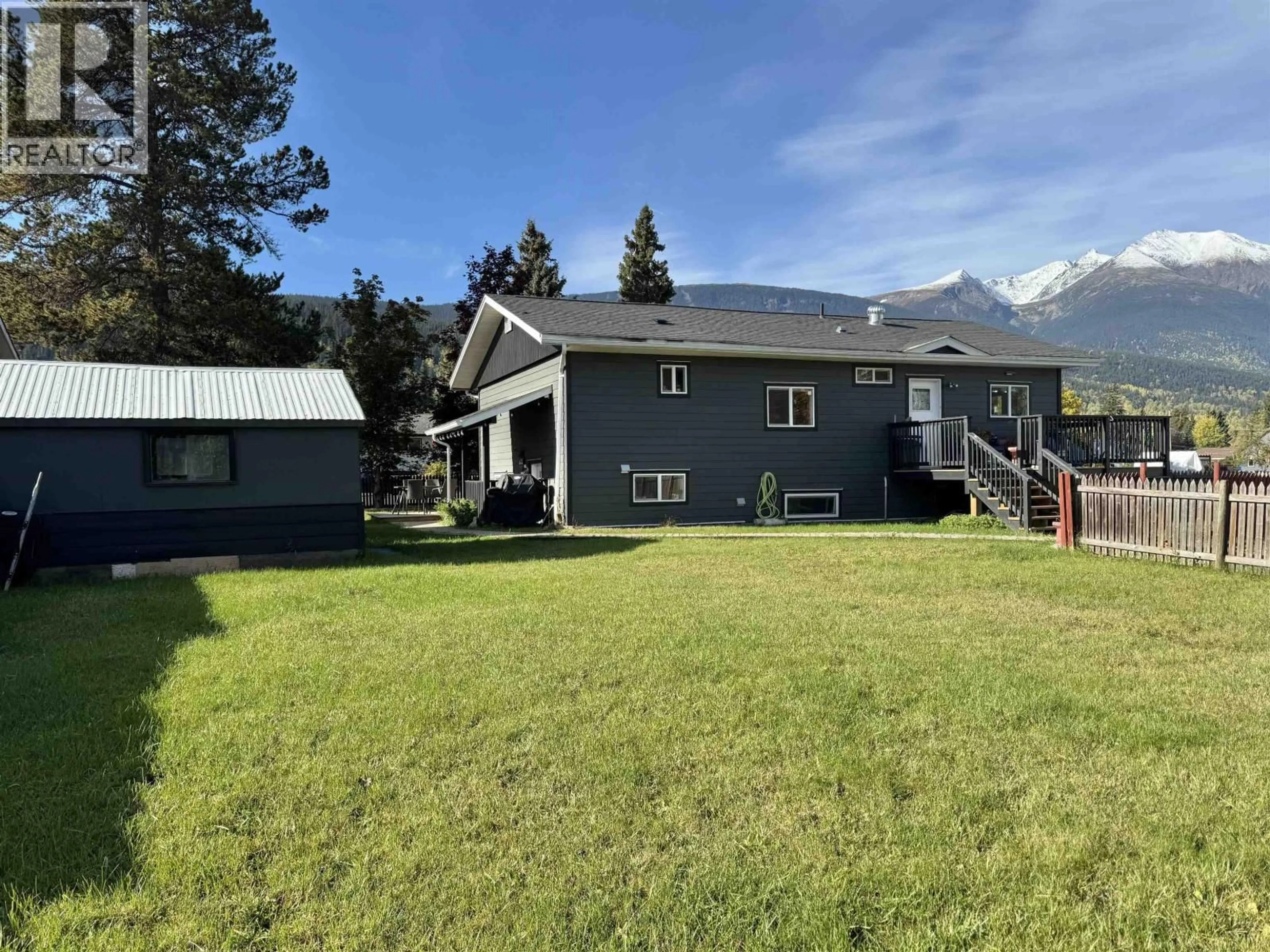 A pic from outside/outdoor area/front of a property/back of a property/a pic from drone, mountain view for 4186 2ND AVENUE, Smithers British Columbia V0J2N0