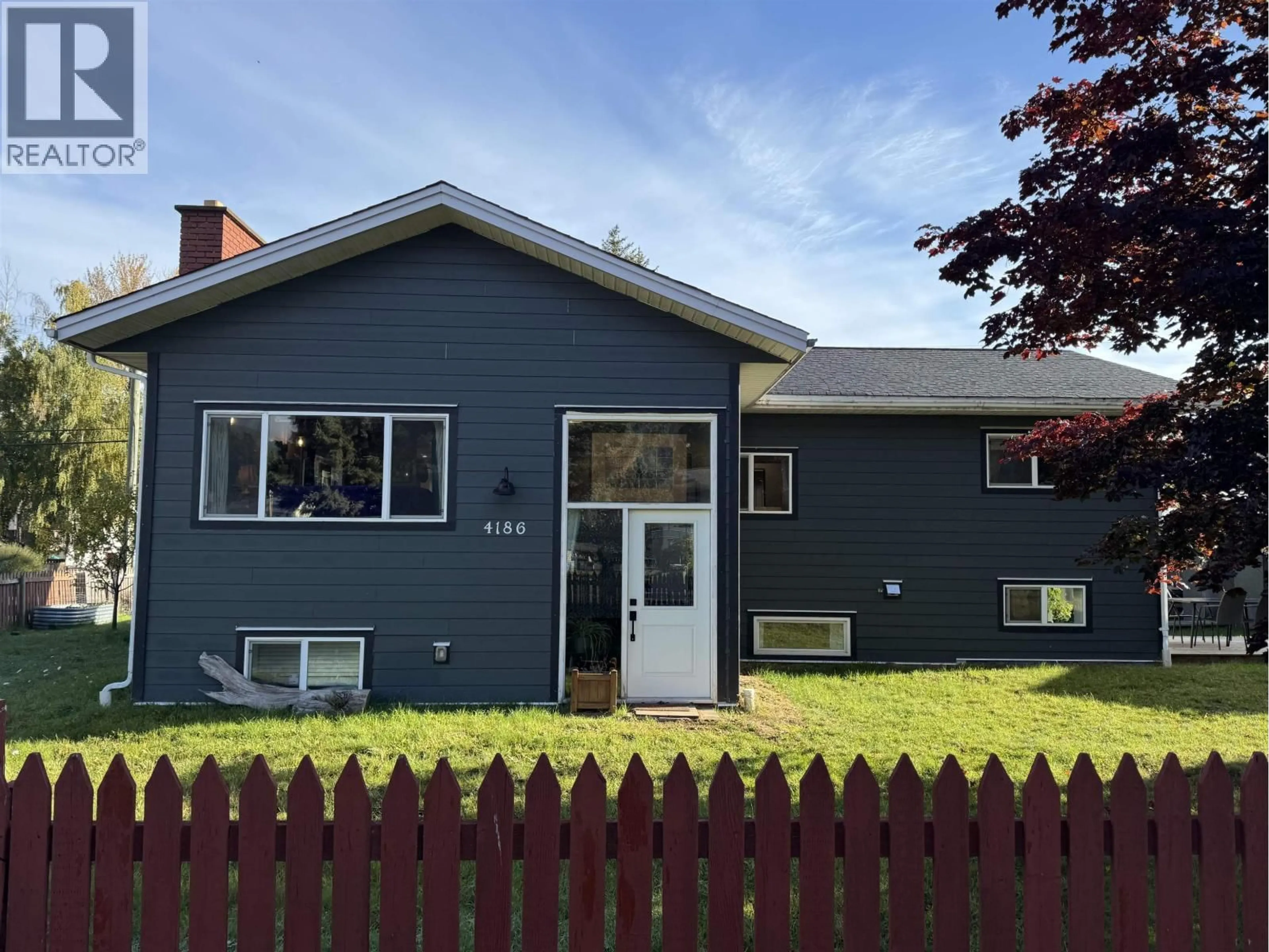Home with vinyl exterior material, street for 4186 2ND AVENUE, Smithers British Columbia V0J2N0
