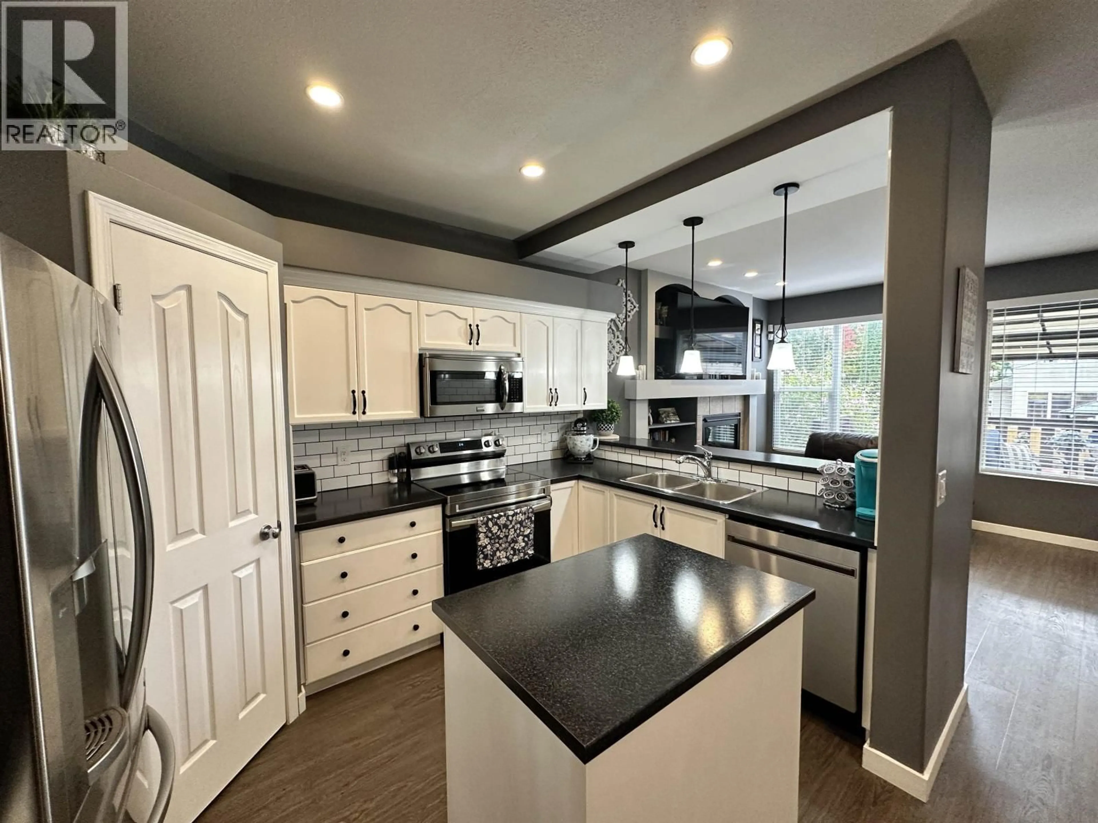 Open concept kitchen, ceramic/tile floor for 24292 102B AVENUE, Maple Ridge British Columbia V2W1Y1