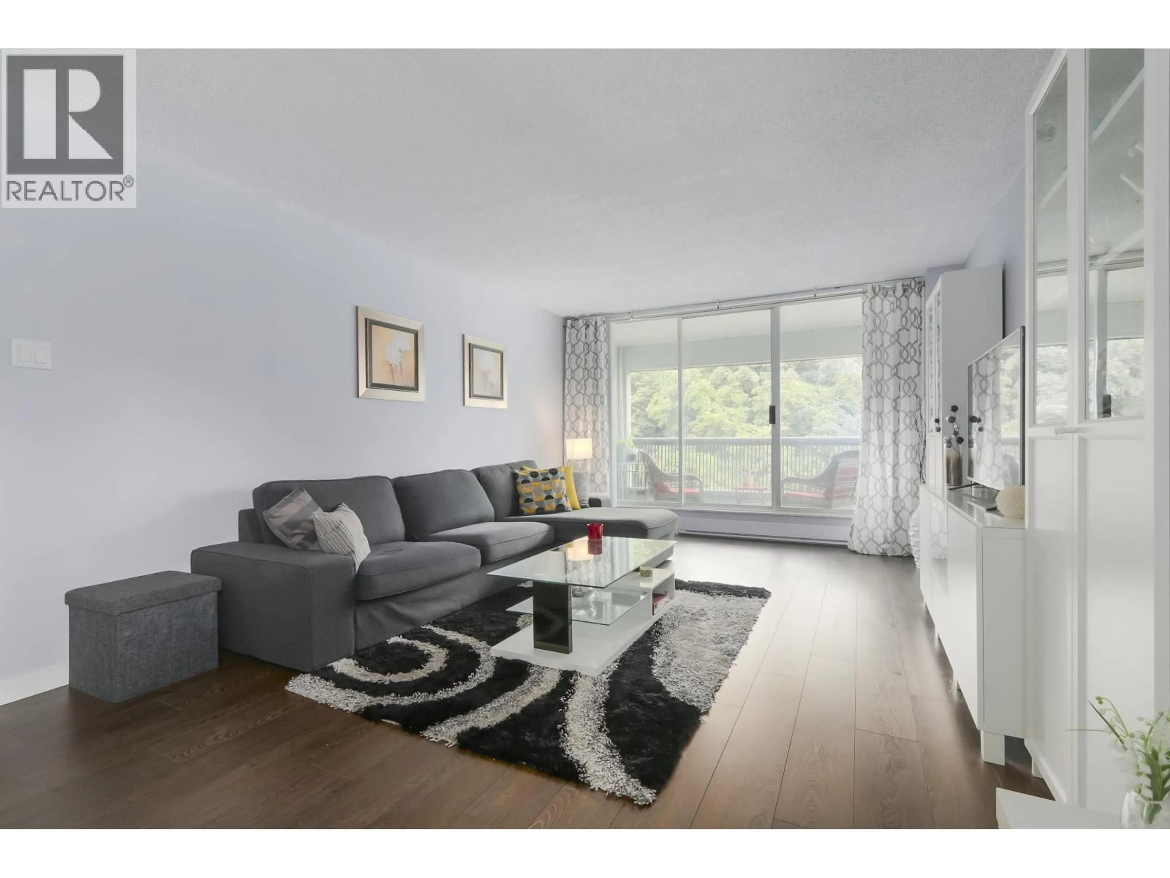 Living room with furniture, wood/laminate floor for 402 - 550 EIGHTH STREET, New Westminster British Columbia V3M3R9