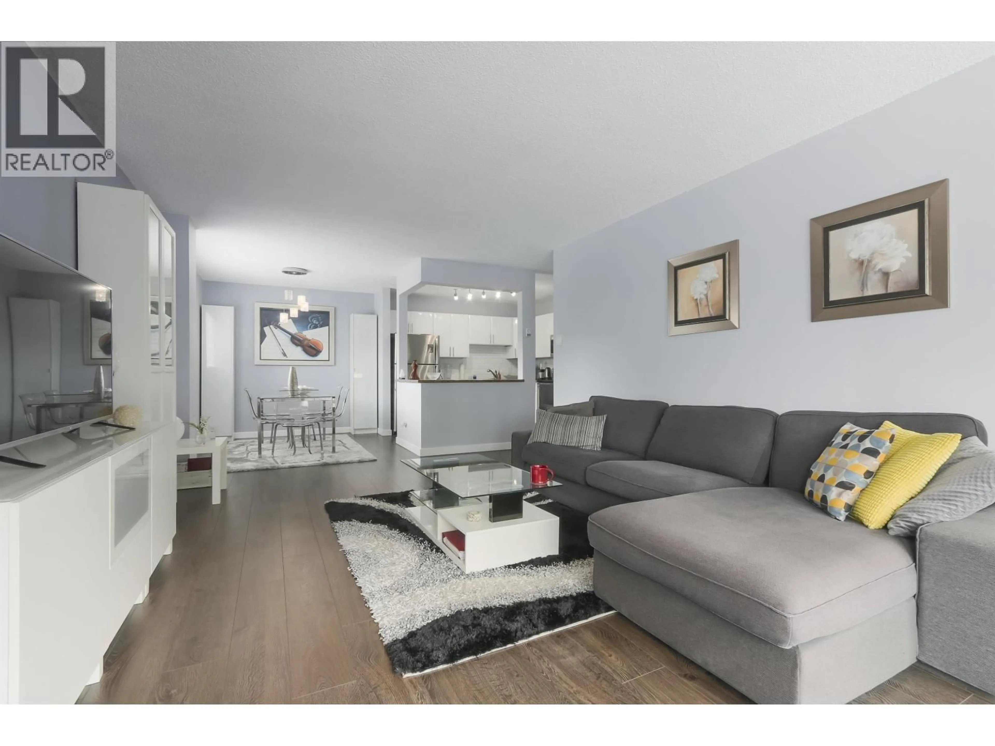 Living room with furniture, wood/laminate floor for 402 - 550 EIGHTH STREET, New Westminster British Columbia V3M3R9
