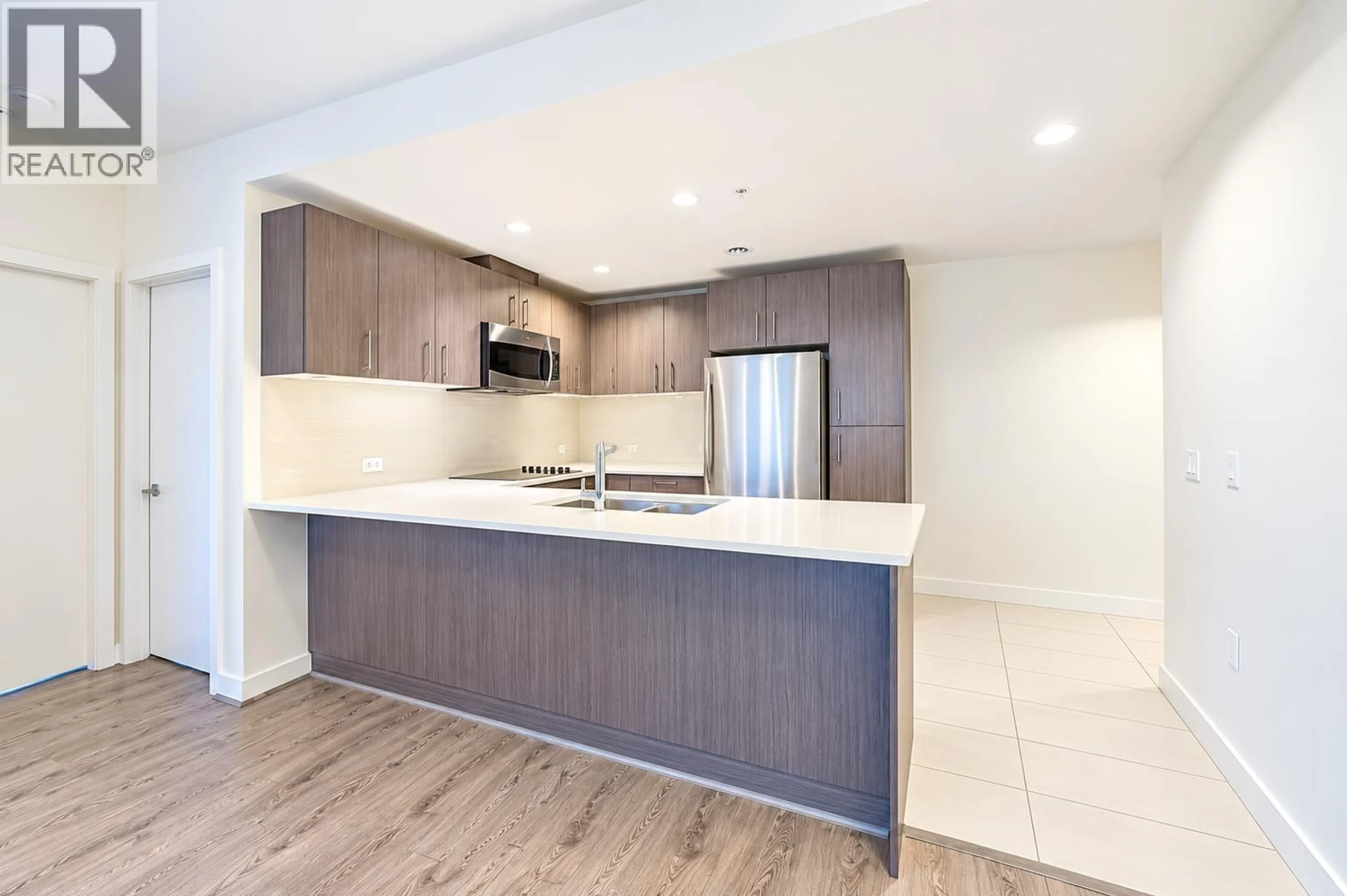Open concept kitchen, unknown for 315 - 5981 GRAY AVENUE, Vancouver British Columbia V6S0G1