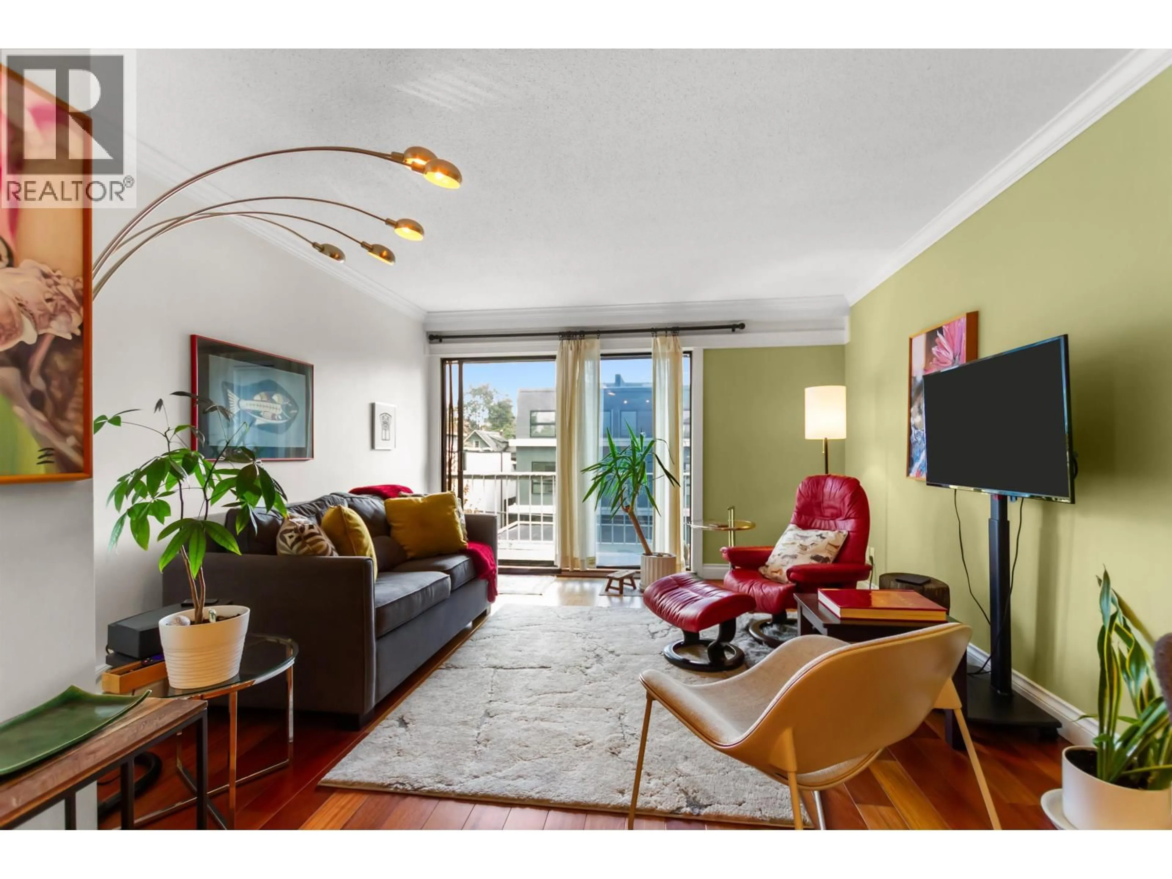 Living room with furniture, wood/laminate floor for 308 - 2040 CORNWALL AVENUE, Vancouver British Columbia V6J1E1
