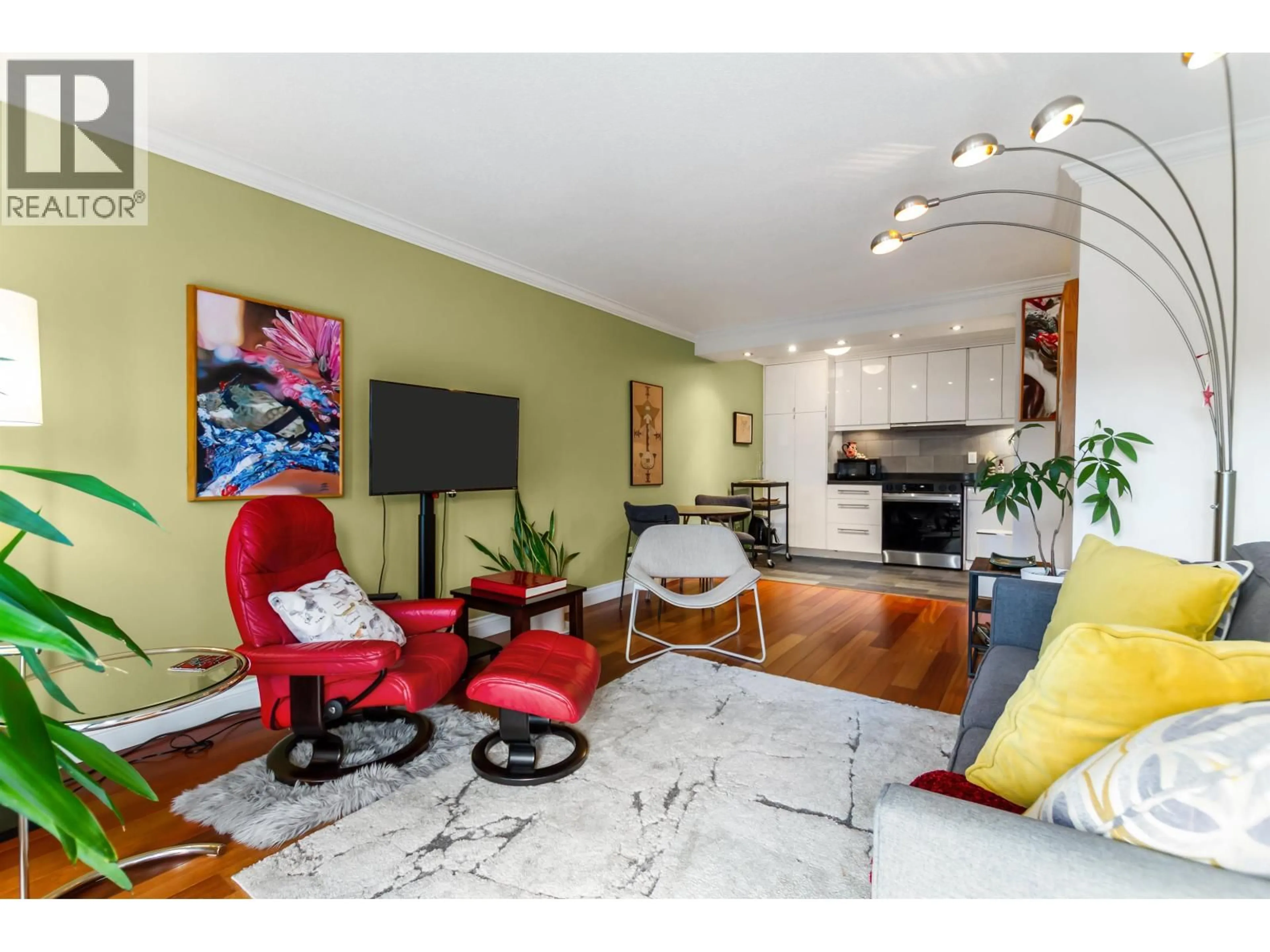 Living room with furniture, wood/laminate floor for 308 - 2040 CORNWALL AVENUE, Vancouver British Columbia V6J1E1