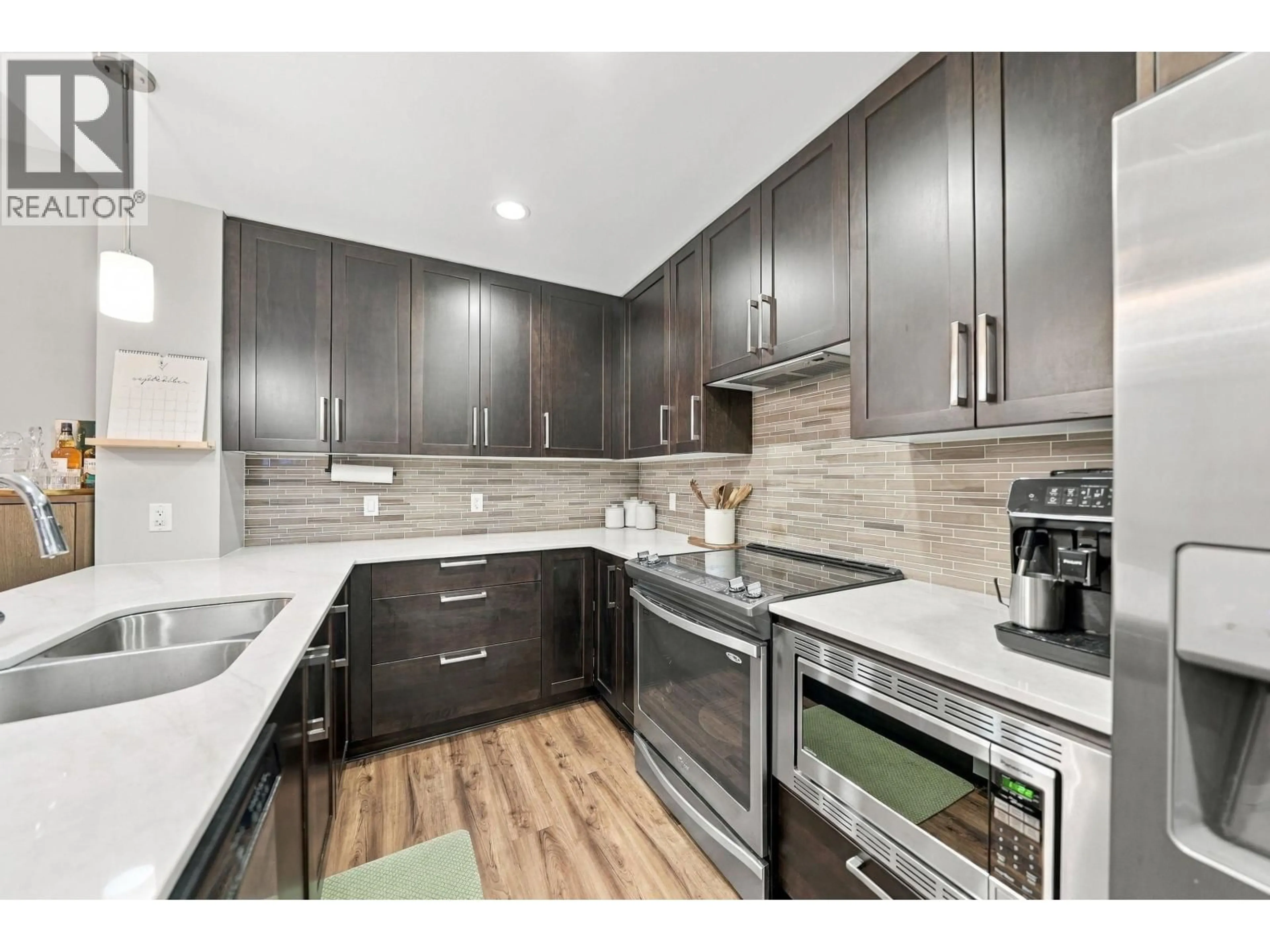Open concept kitchen, unknown for 218 - 2495 WILSON AVENUE, Port Coquitlam British Columbia V3C0E4