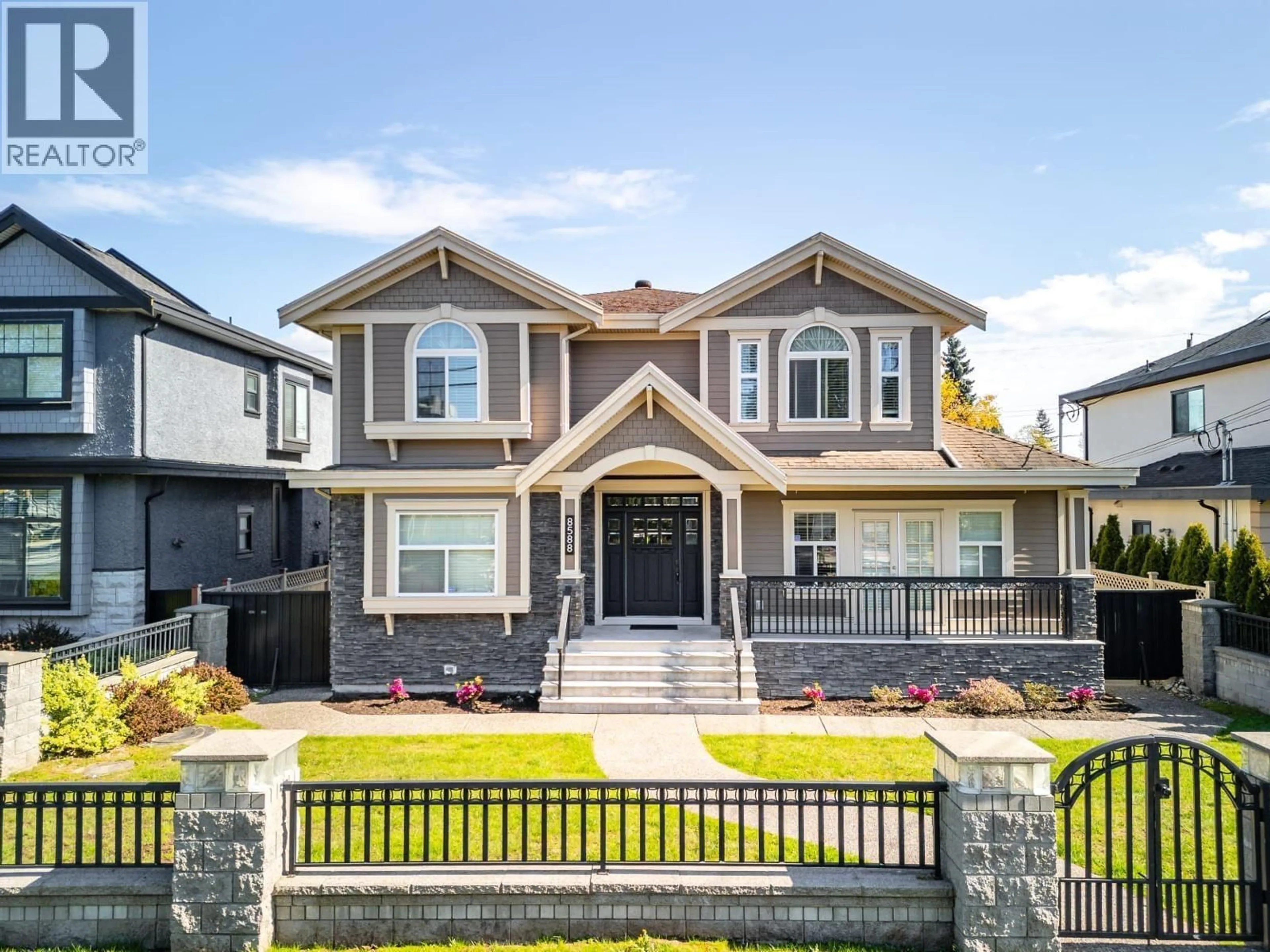 Home with vinyl exterior material, street for 8588 ARMSTRONG AVENUE, Burnaby British Columbia V3N2H5