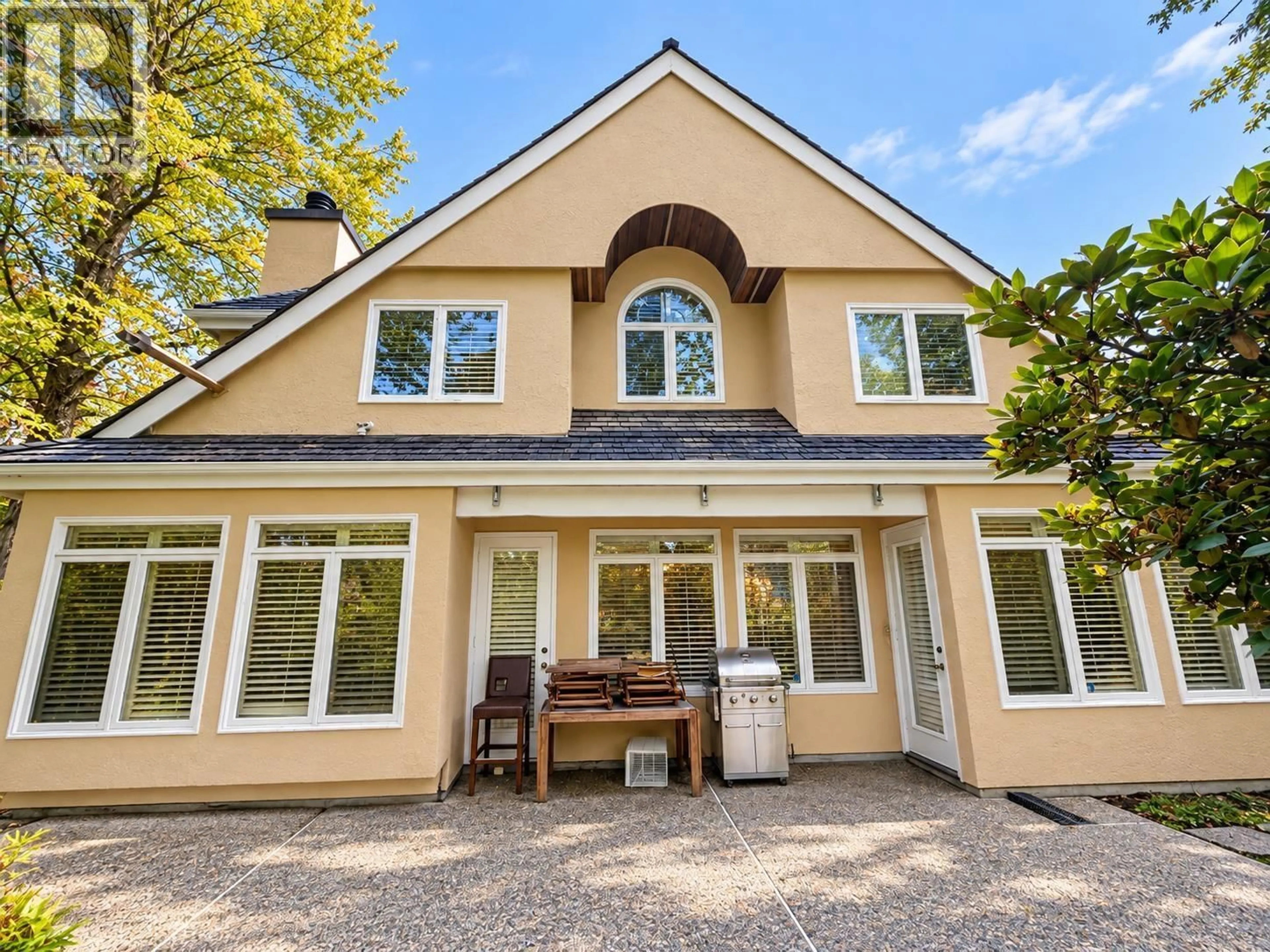 Home with vinyl exterior material, street for 8211 TUGBOAT PLACE, Vancouver British Columbia V6P6P9