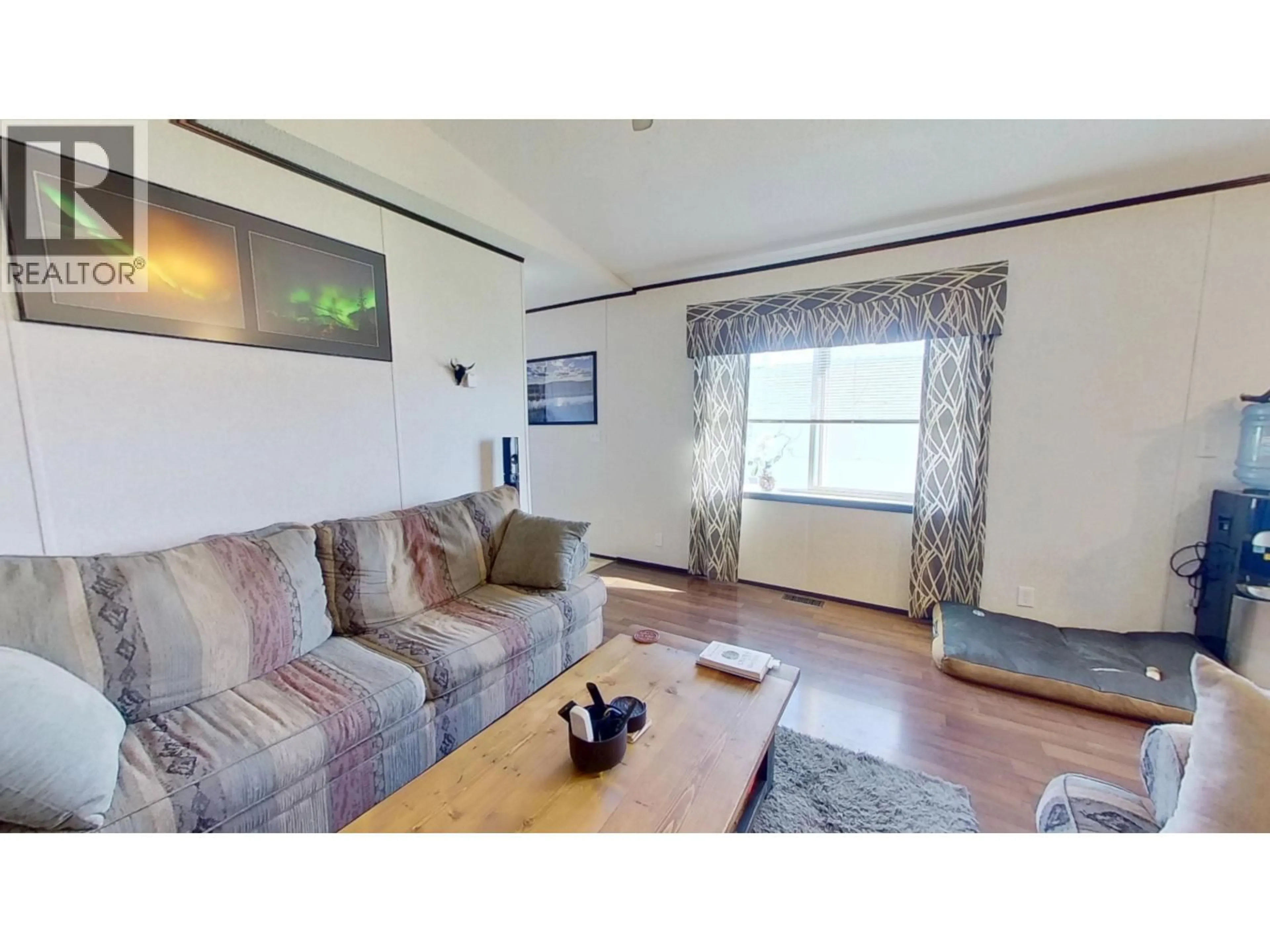 Living room with furniture, wood/laminate floor for 26A - 6828 ALCAN FRONTAGE ROAD, Fort St. John British Columbia V0C1C3