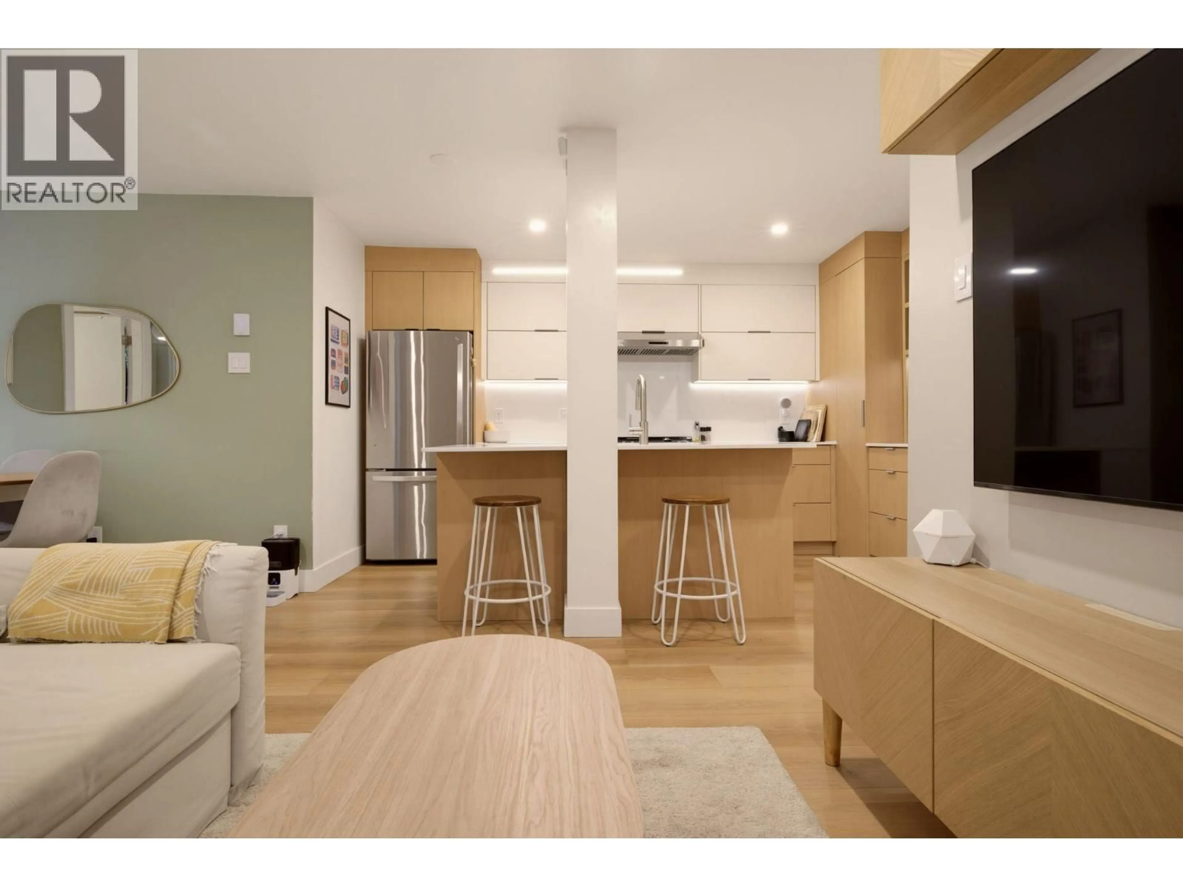 Open concept kitchen, wood/laminate floor for 204 - 1345 COMOX STREET, Vancouver British Columbia V6E4E4