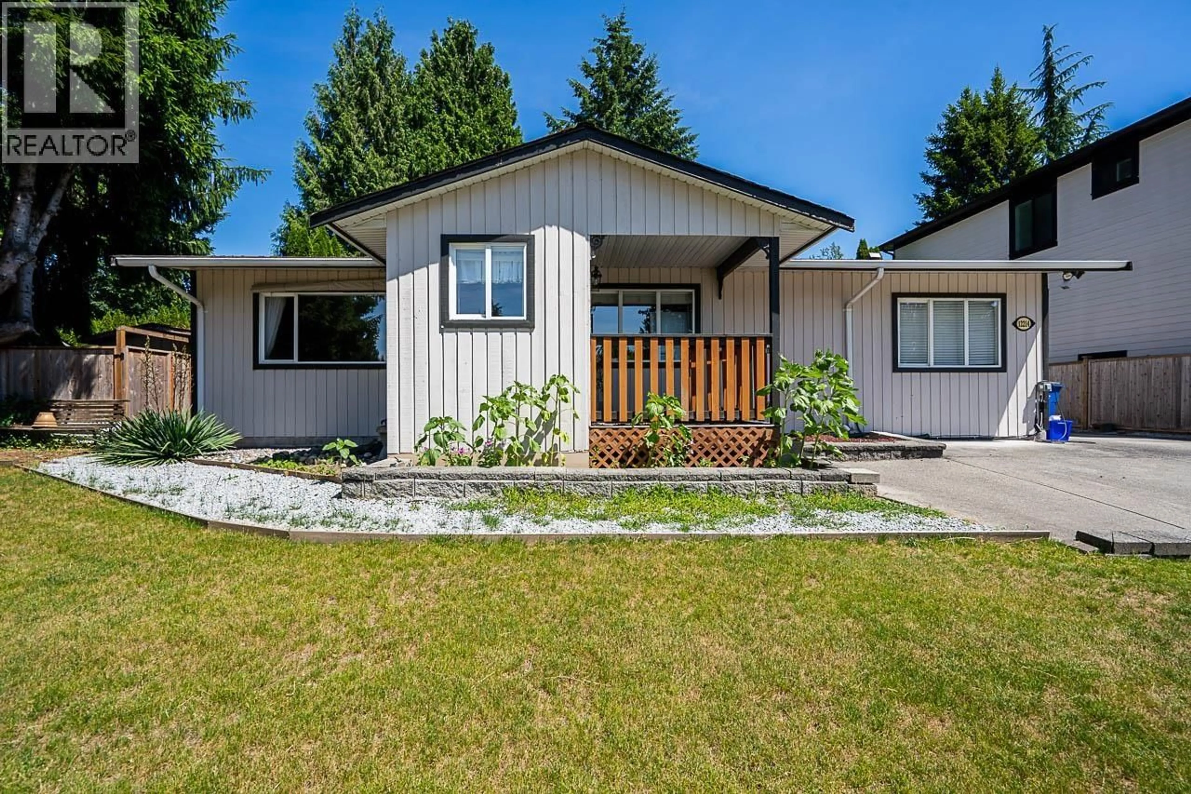 Home with vinyl exterior material, street for 12214 211 STREET, Maple Ridge British Columbia V2X8C9