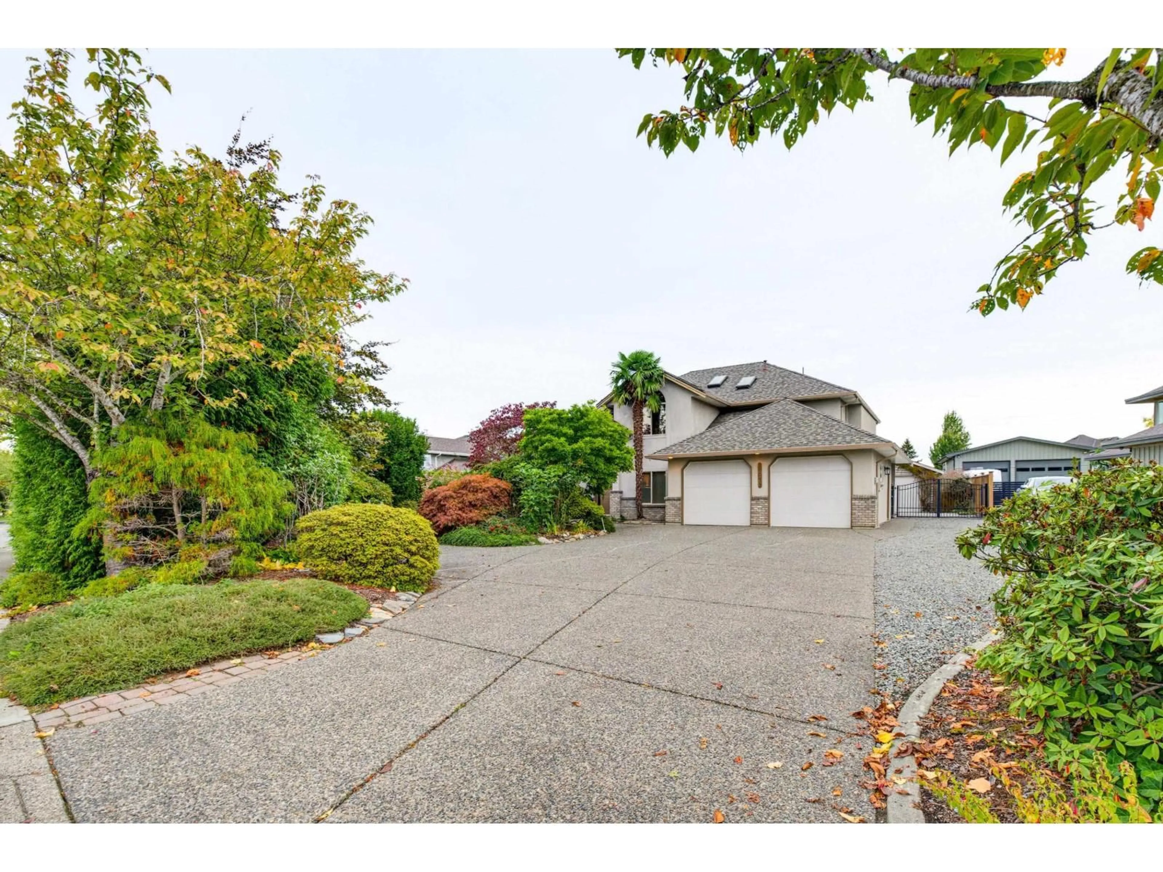 Home with vinyl exterior material, street for 21679 52 AVENUE, Langley British Columbia V2Y1L7