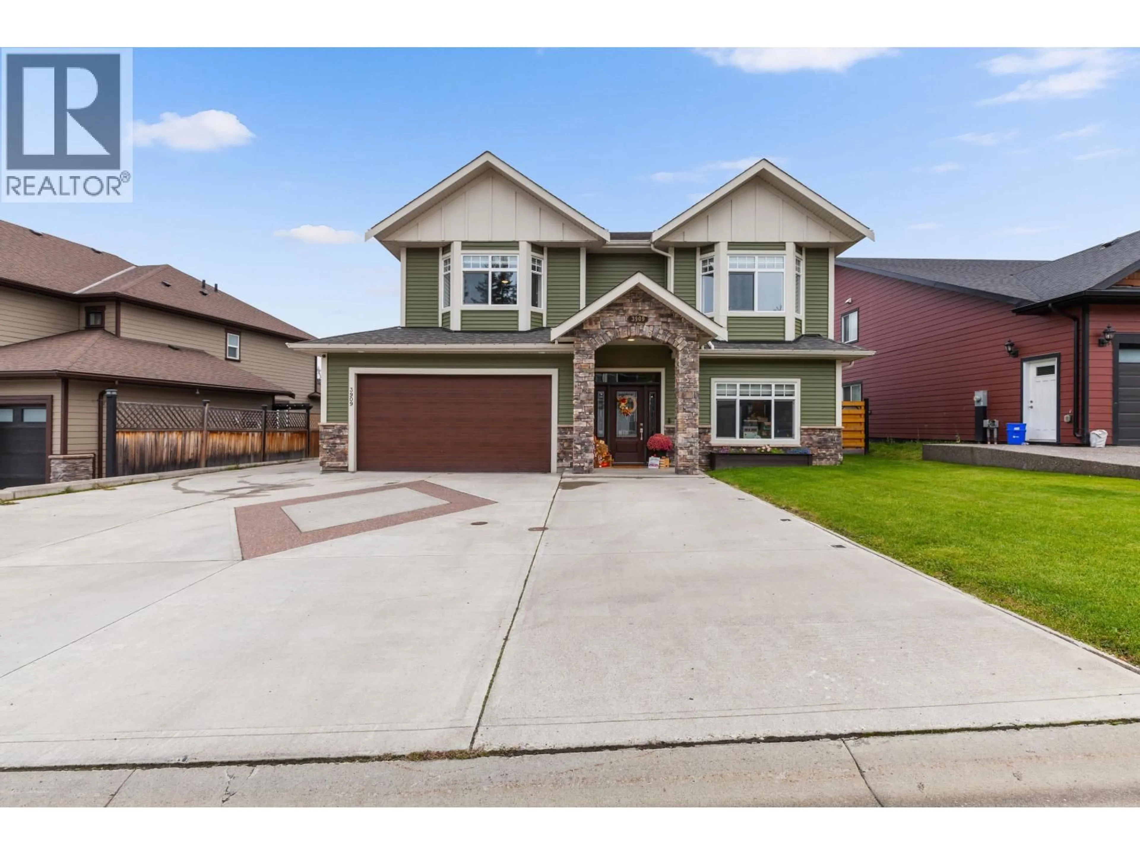 Home with brick exterior material, street for 3909 BARNES DRIVE, Prince George British Columbia V2N0G3