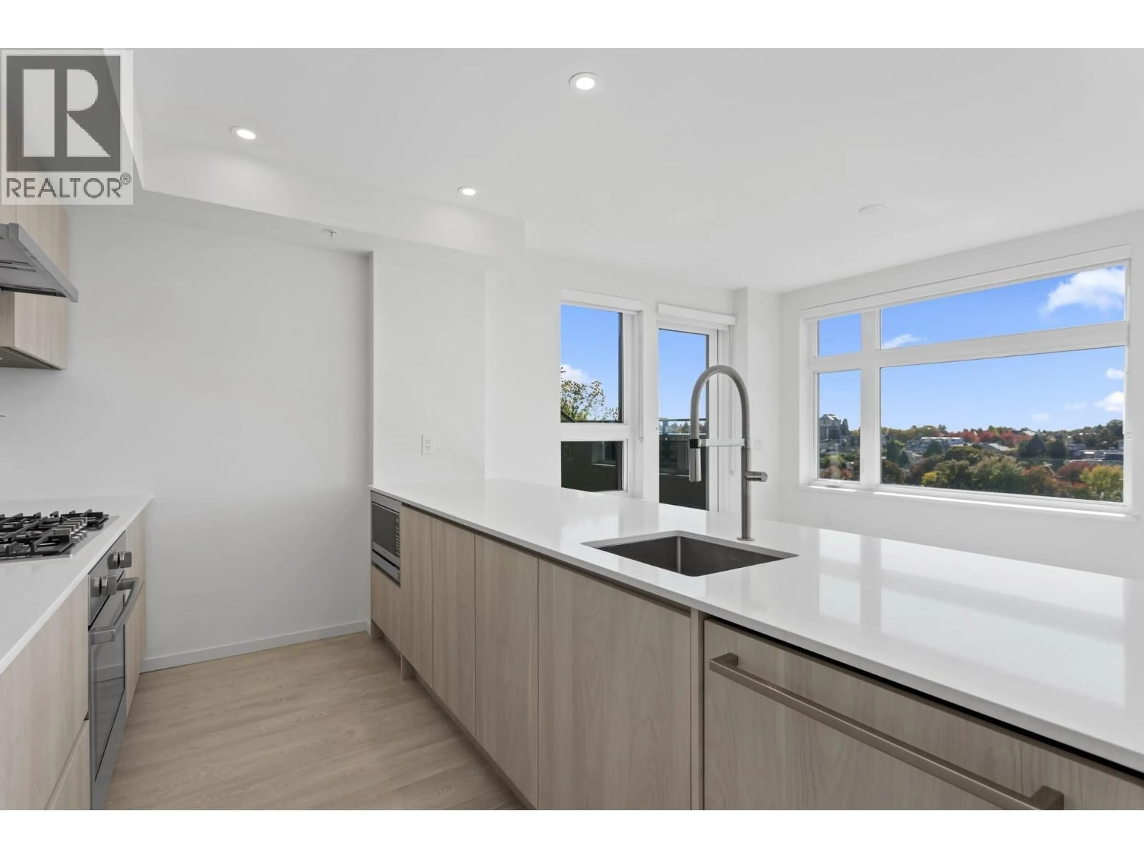 Open concept kitchen, unknown for 602 - 3264 VANNESS STREET, Vancouver British Columbia V5R0L5